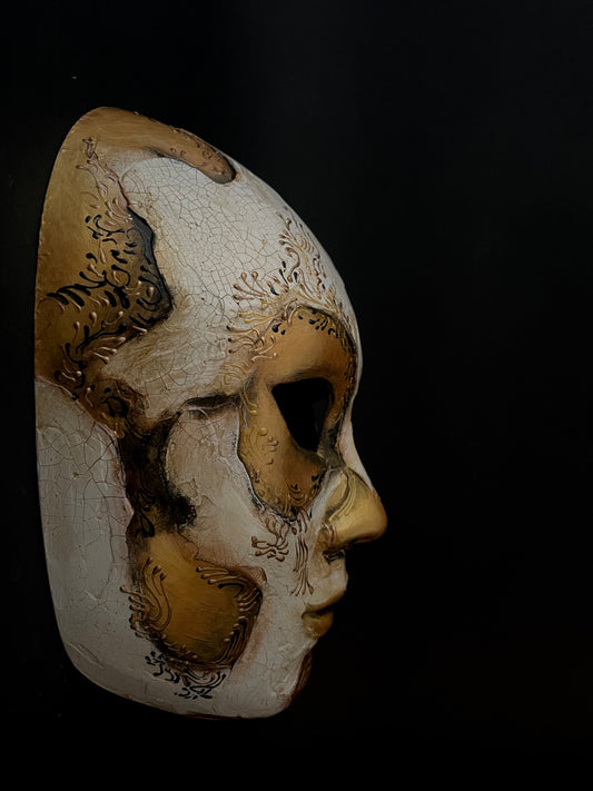 White and gold skull. Masquerade mask.