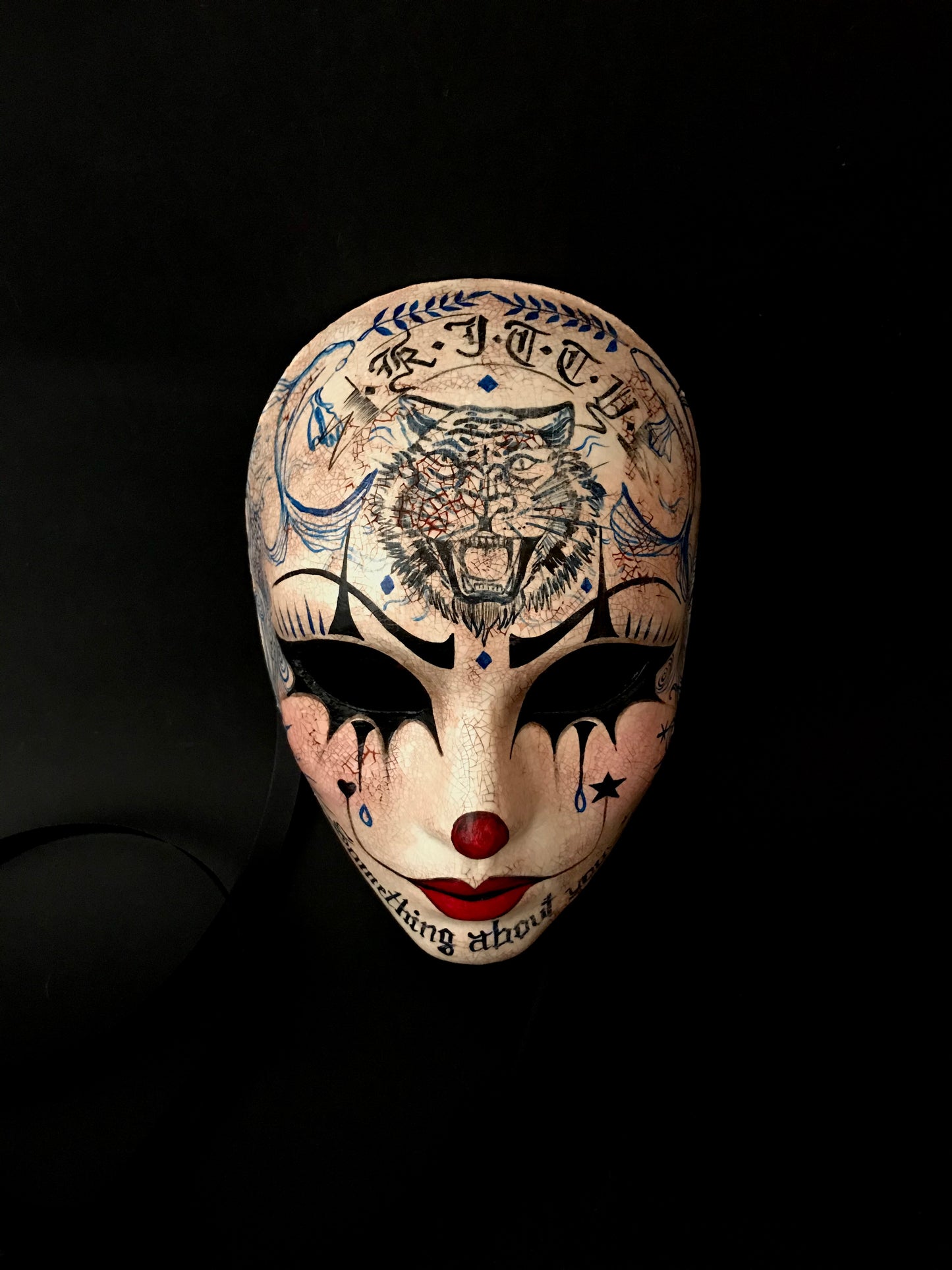 Pierrot mask with tattoos