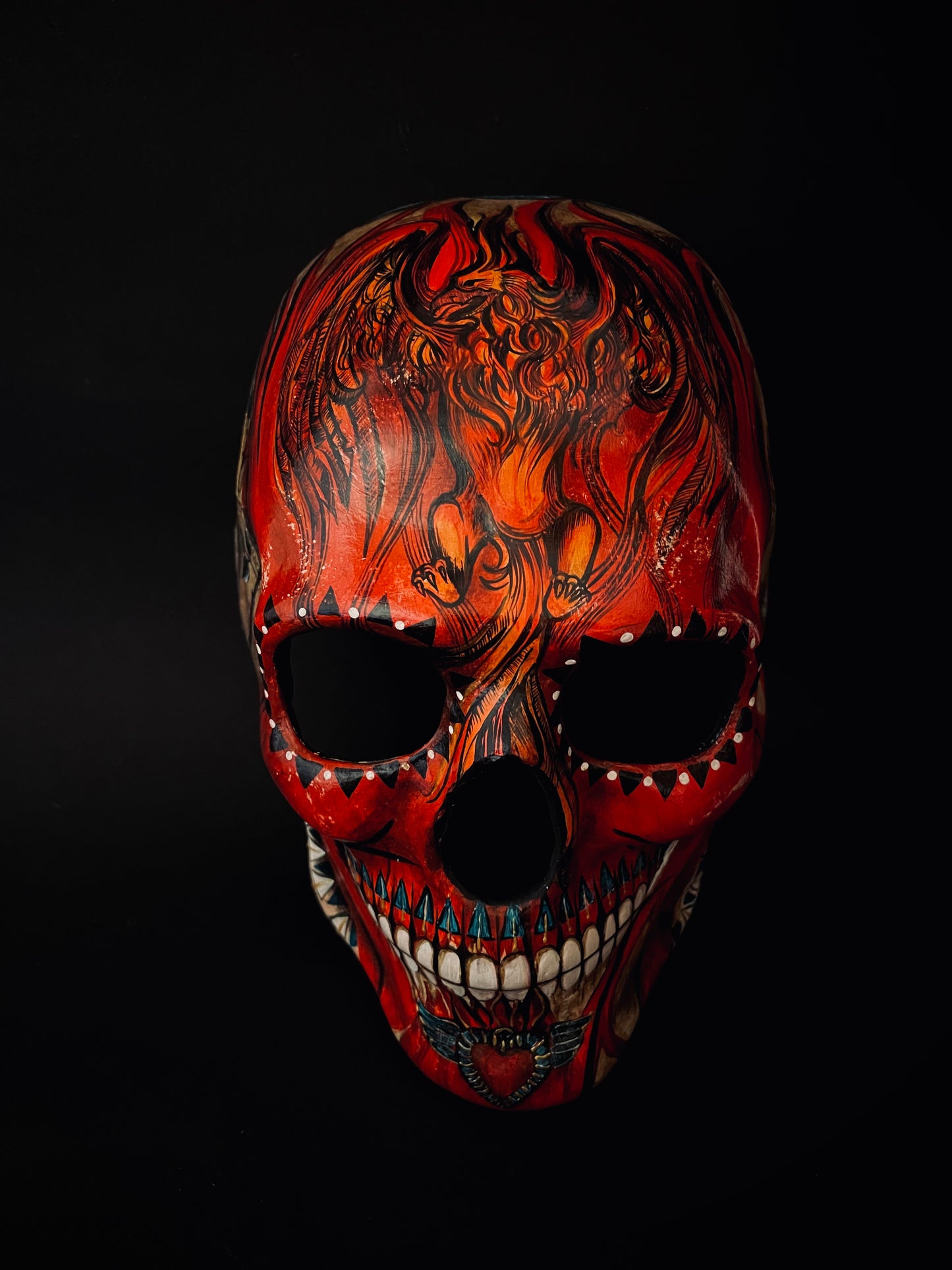 Red skull with phoenix bird. Skull mask.