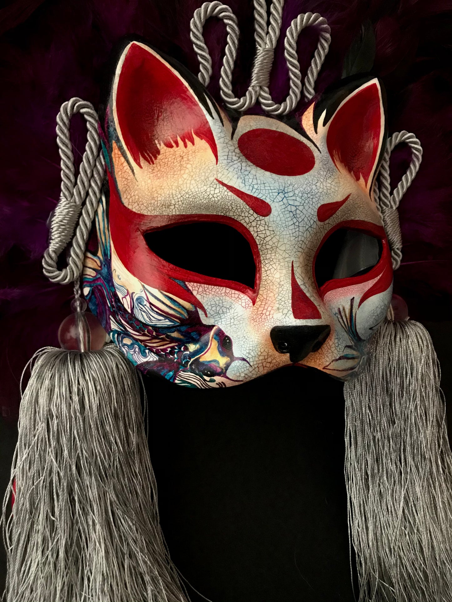 Kitsune mask with feathers