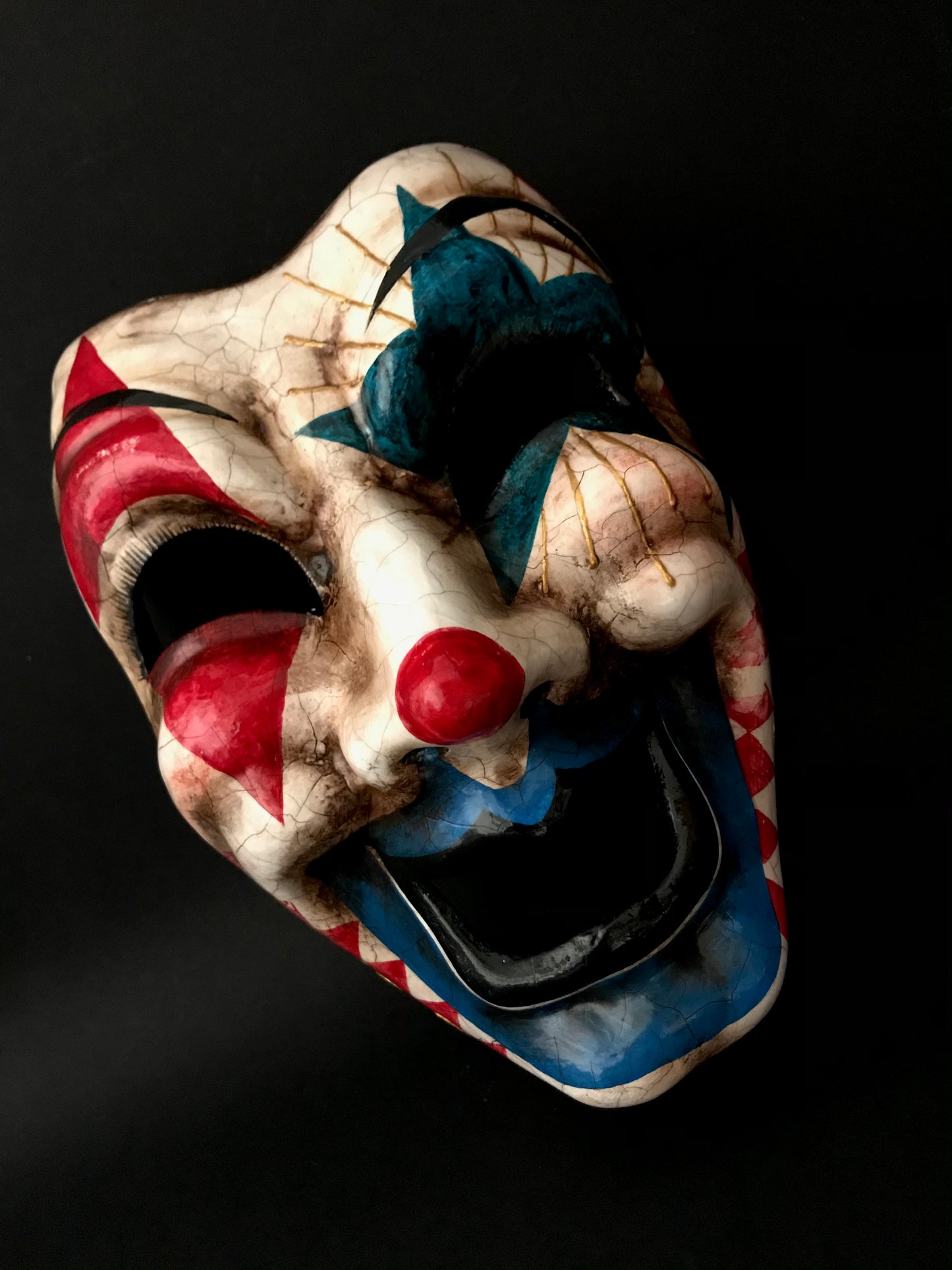 Red and blue clown mask