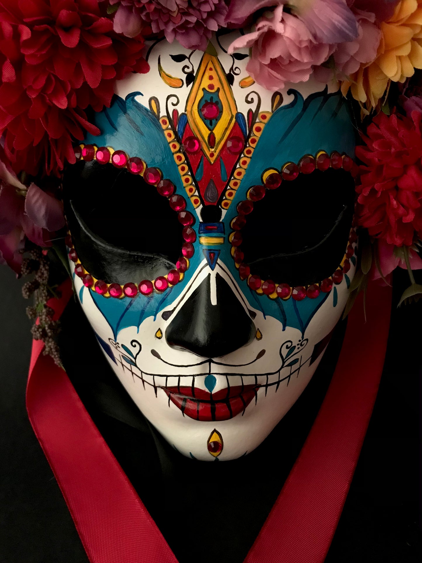 Catrina with colored flowers