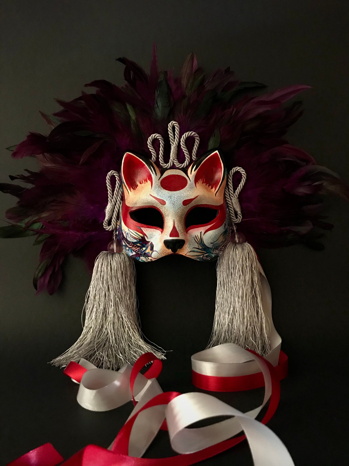 Kitsune mask with feathers