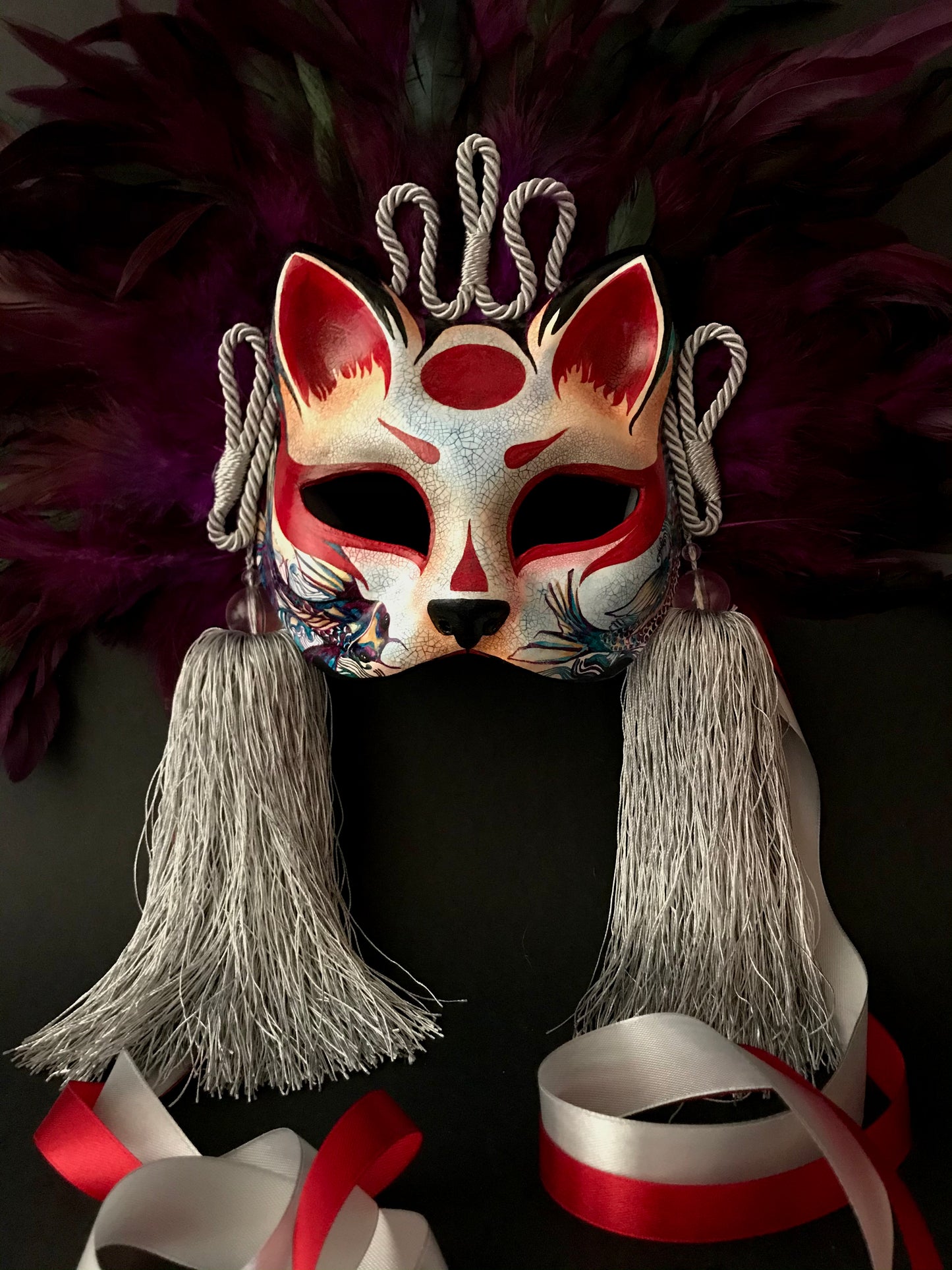 Kitsune mask with feathers