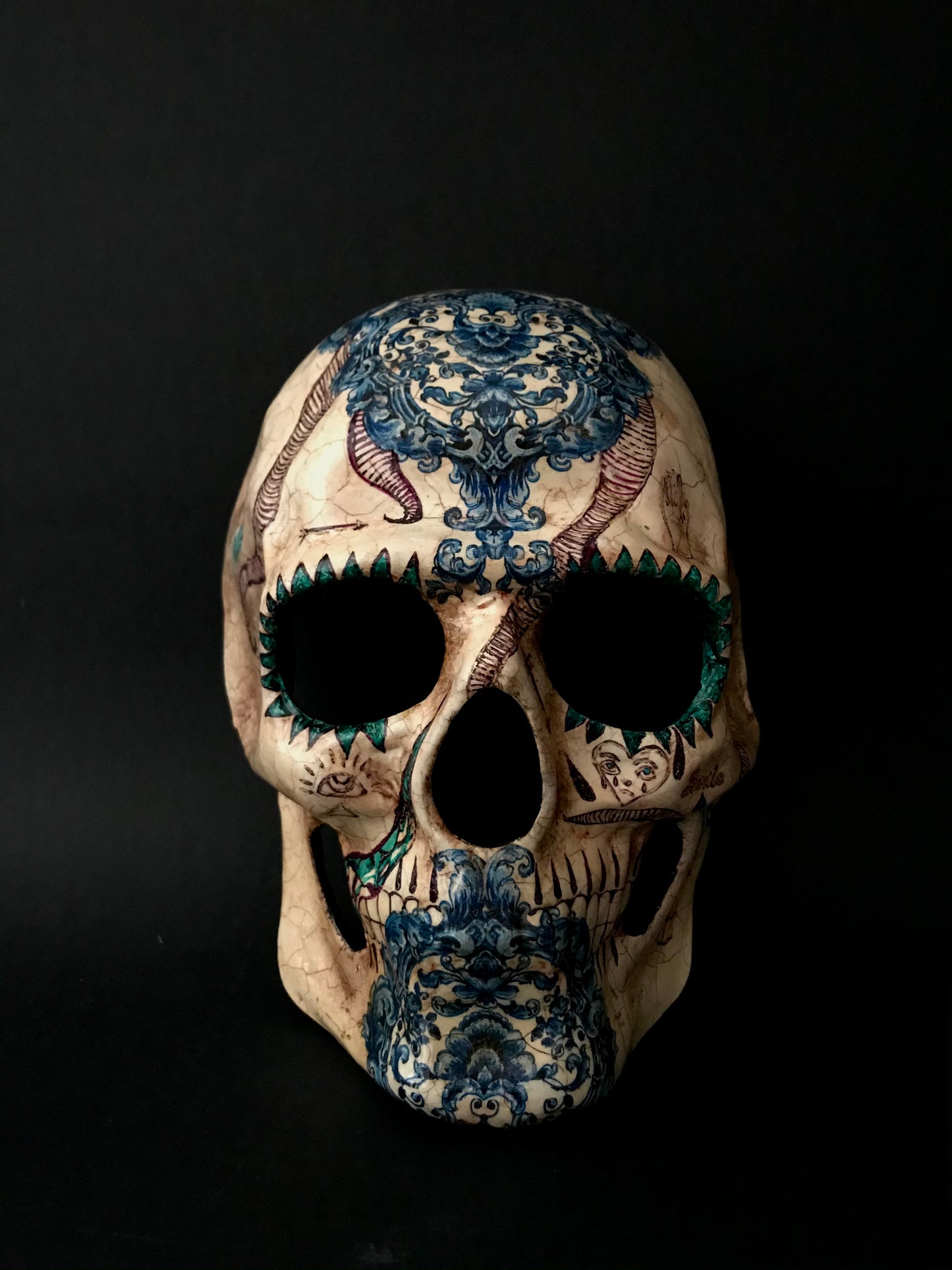 Skull mask with doodles