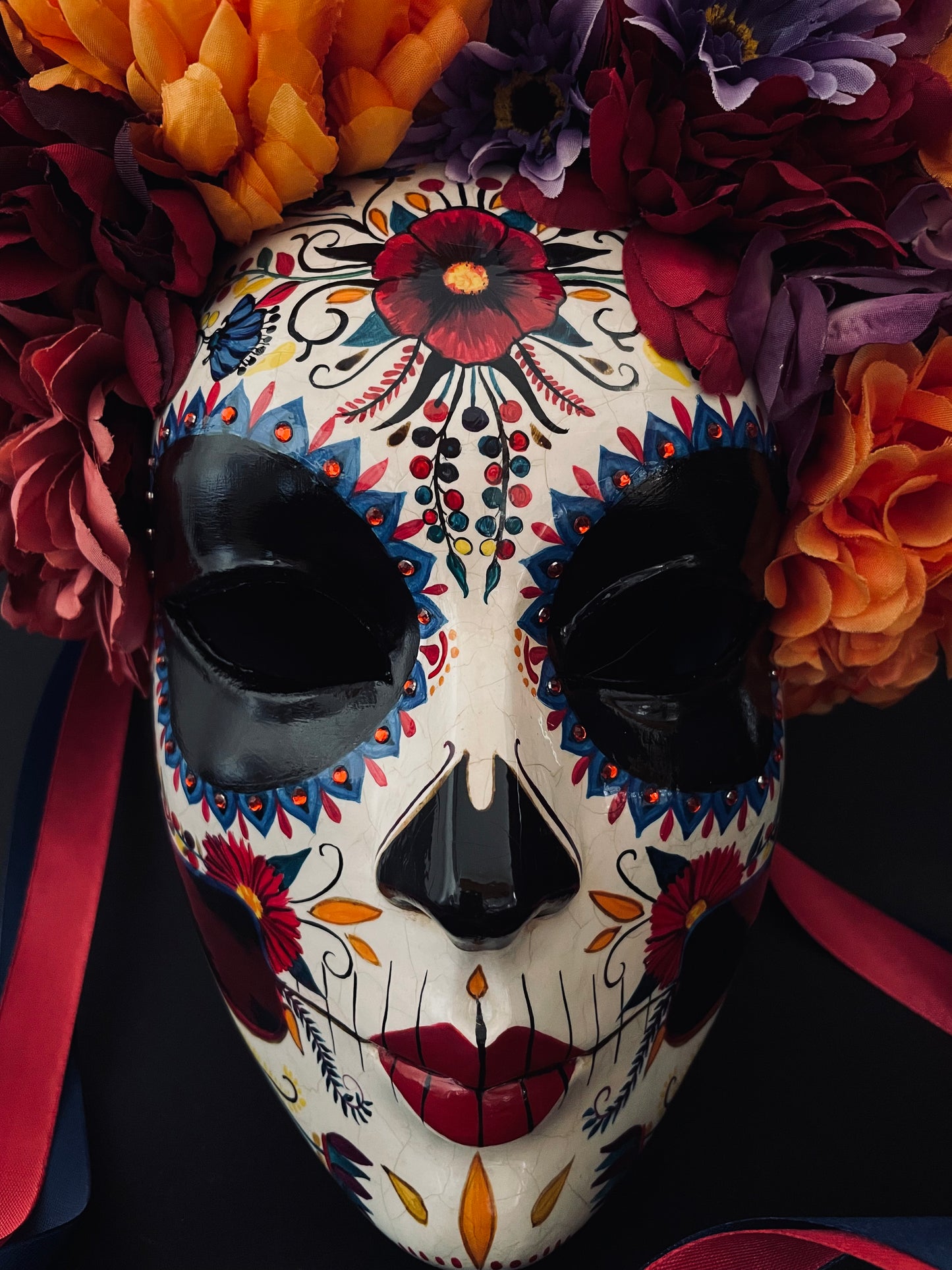 Catrina mask with colored flowers