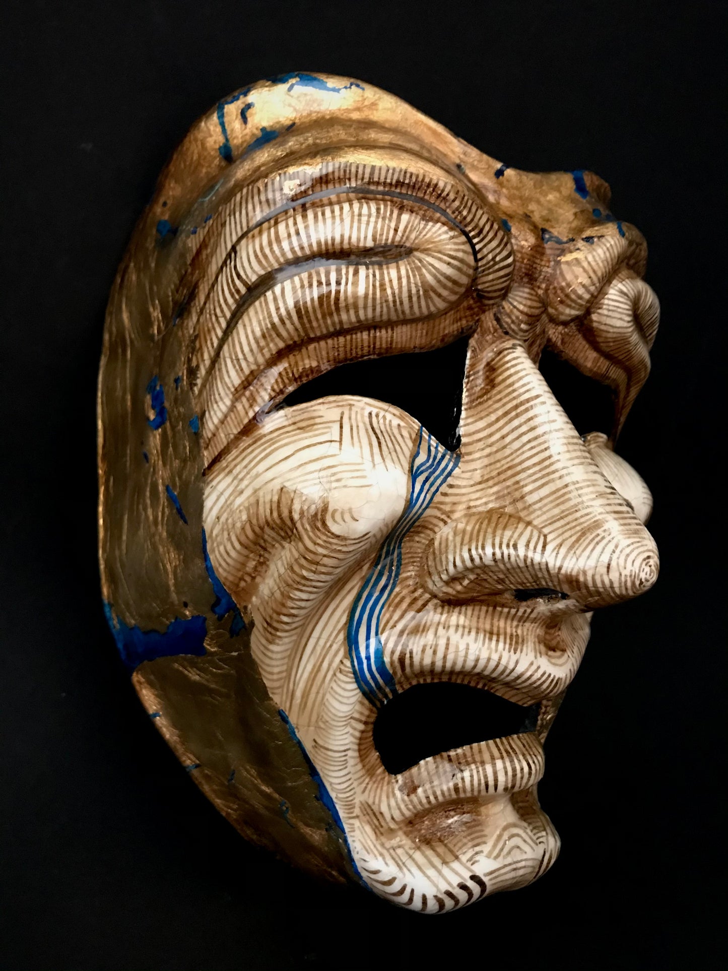 Tragedy mask with gold