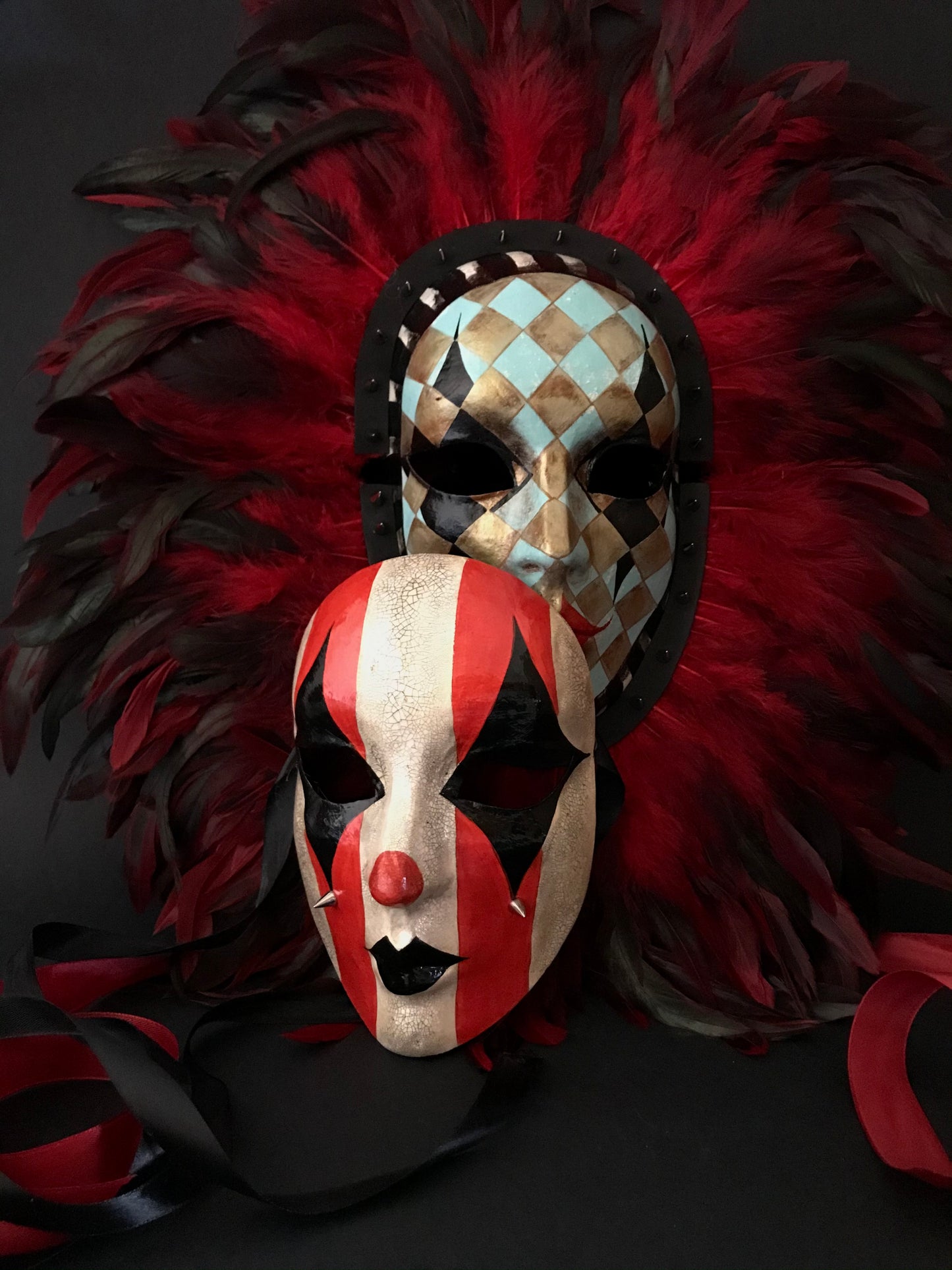 Double mask with feathers