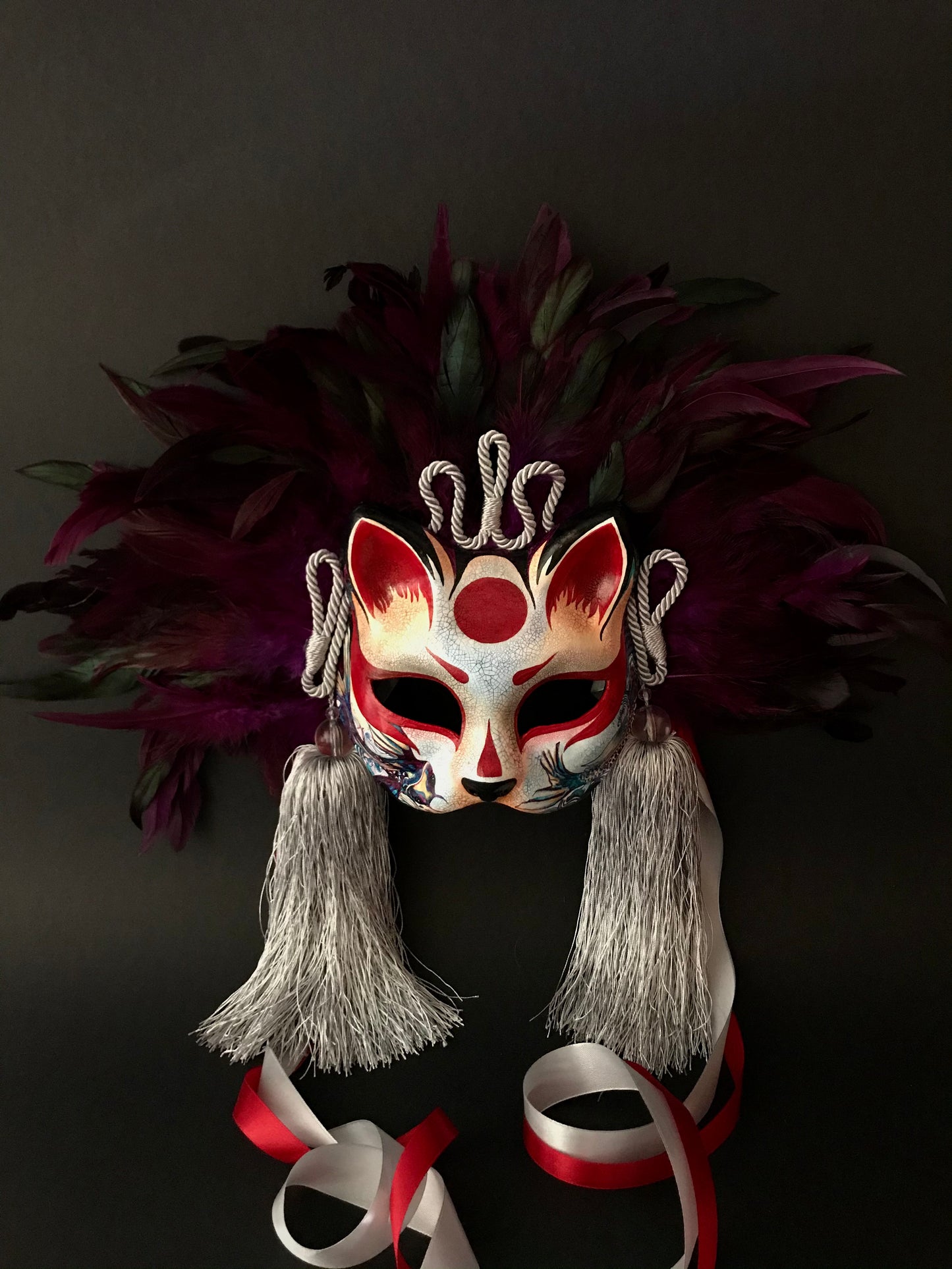 Kitsune mask with feathers