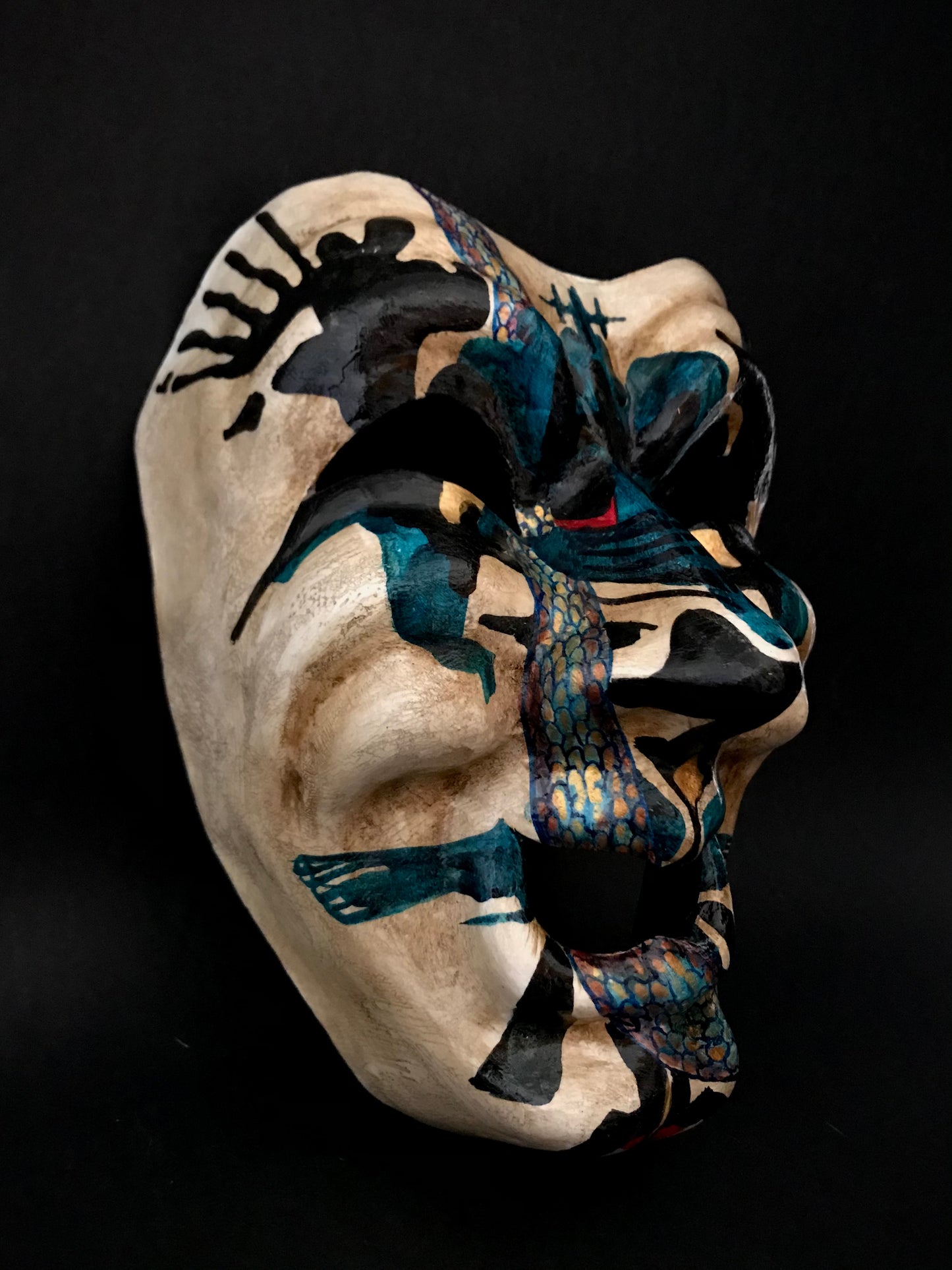 Inkblot clown mask. Clown with snakes