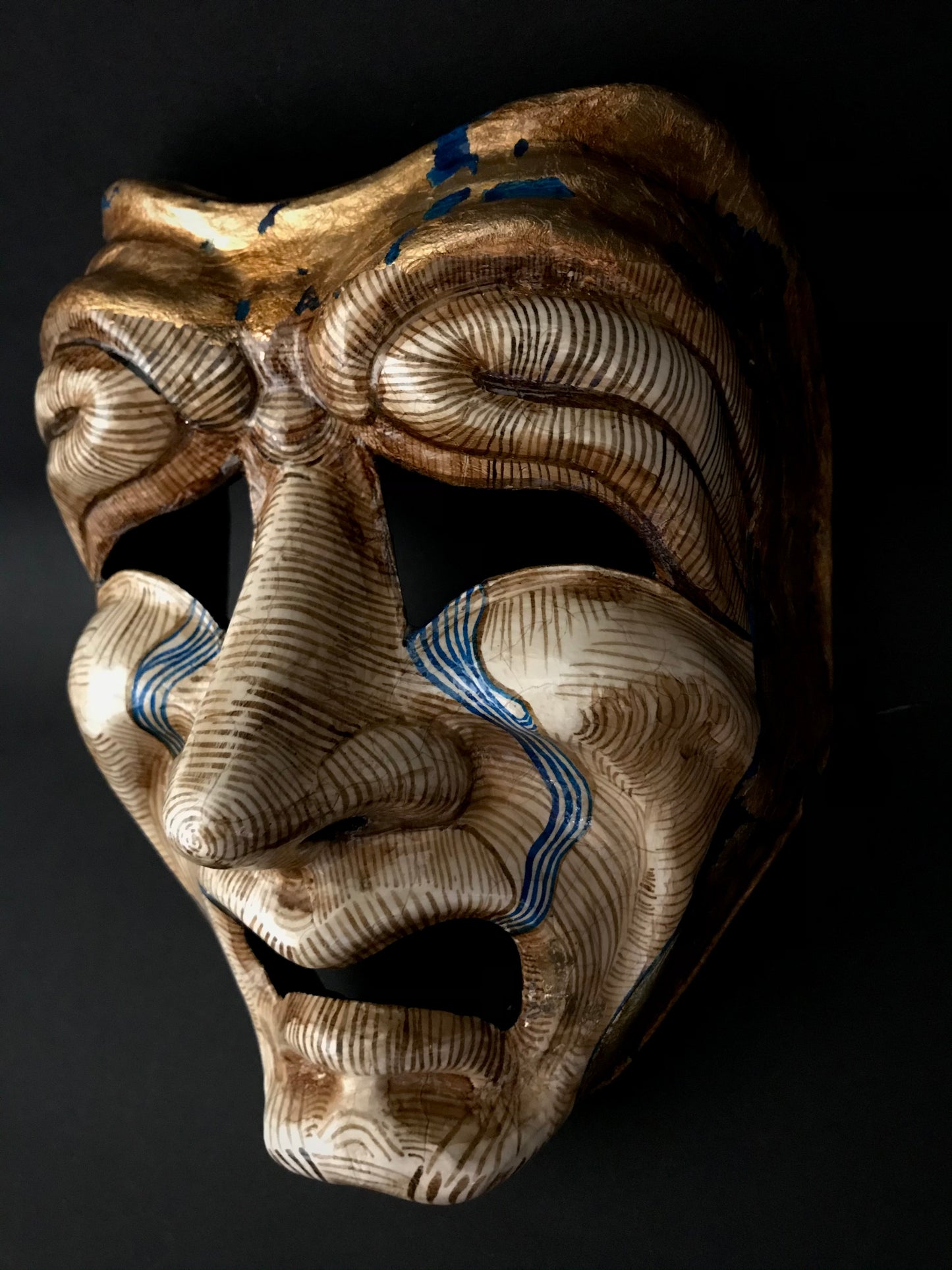 Tragedy mask with gold