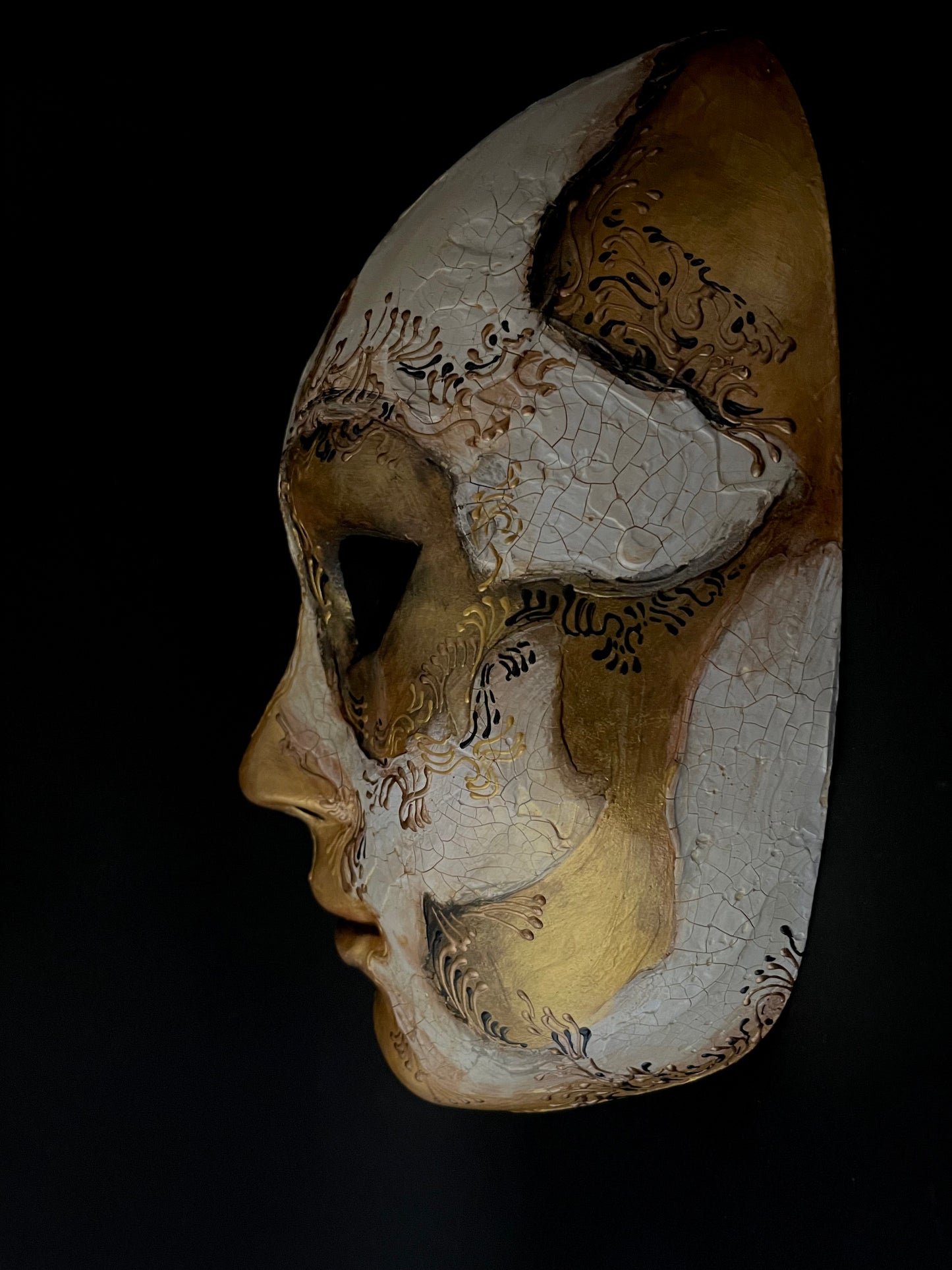 White and gold skull. Masquerade mask.