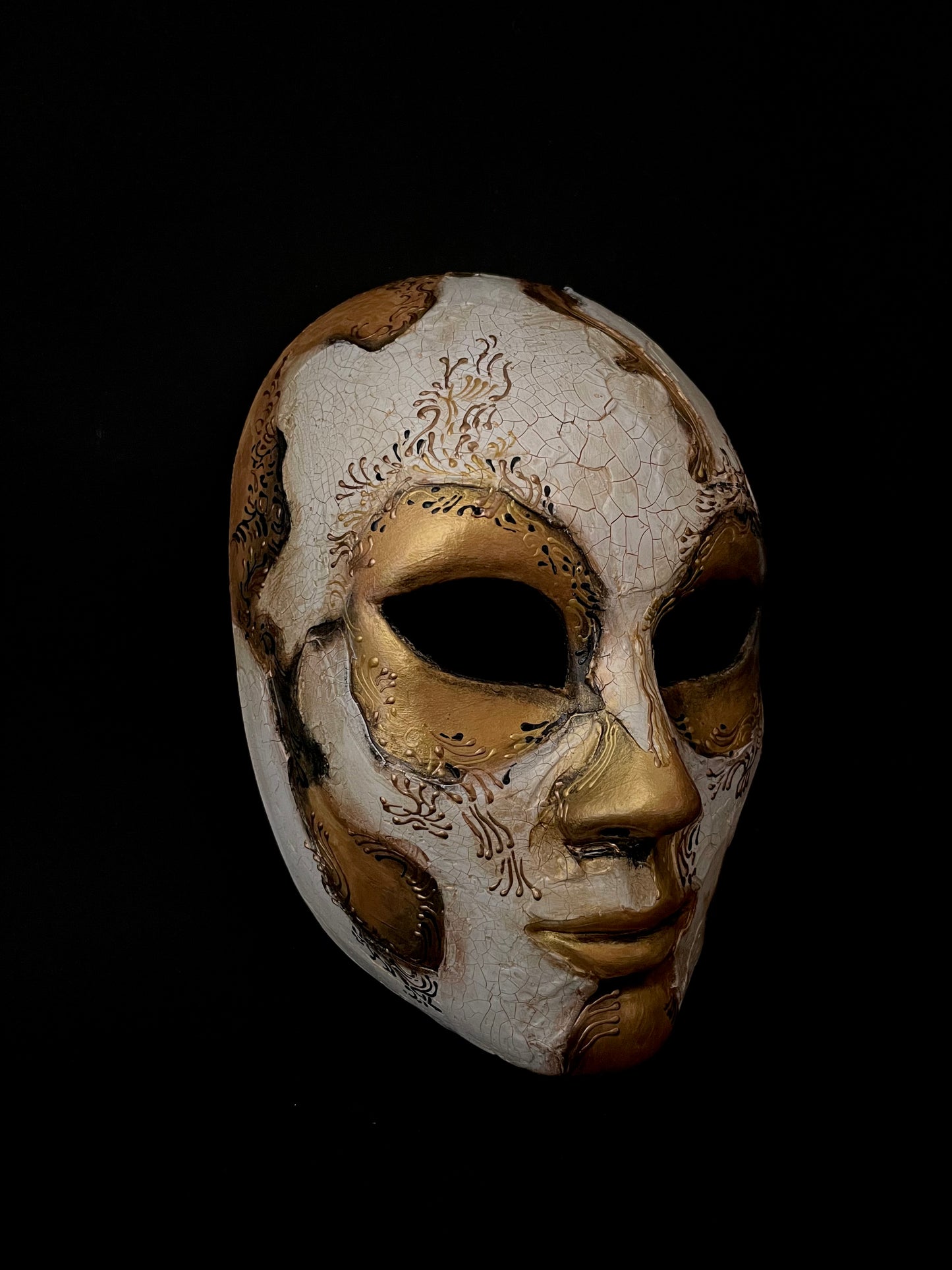 White and gold skull. Masquerade mask.