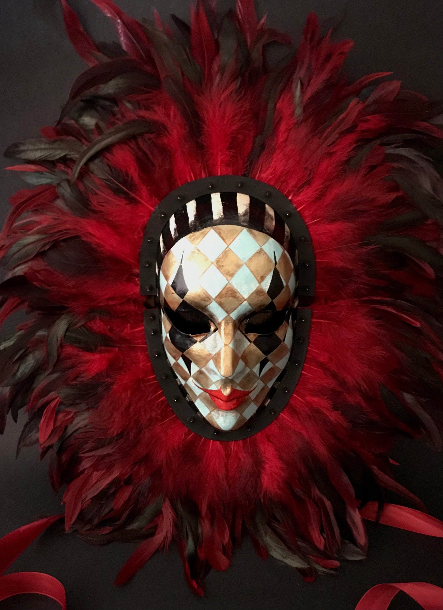 Double mask with feathers