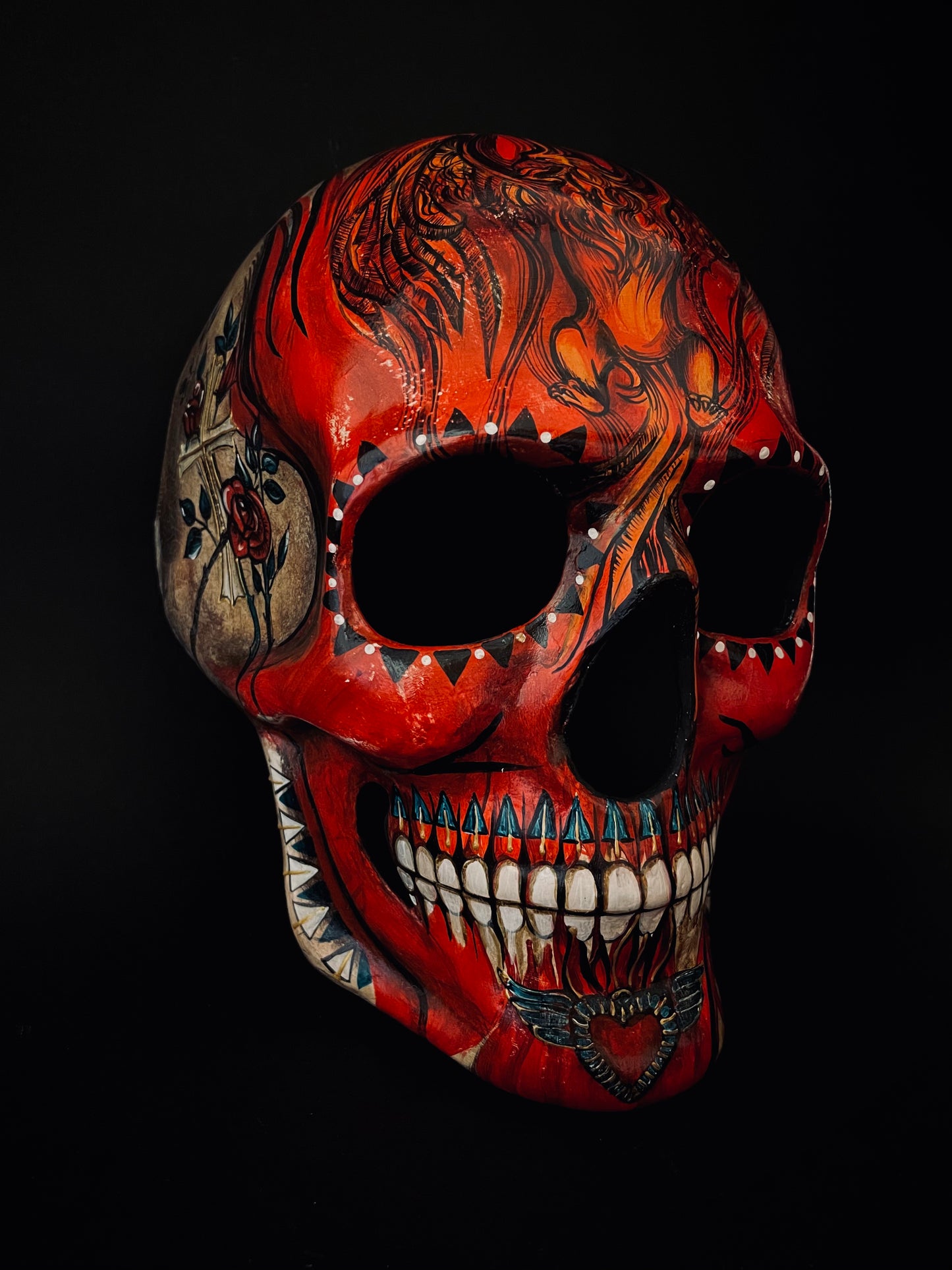 Red skull with phoenix bird. Skull mask.