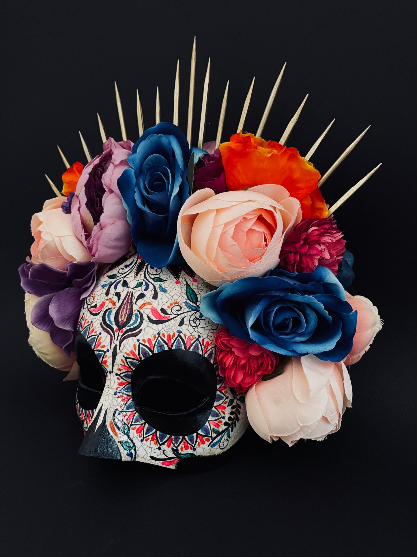 Bright colored Catrina mask. Day of the dead art.