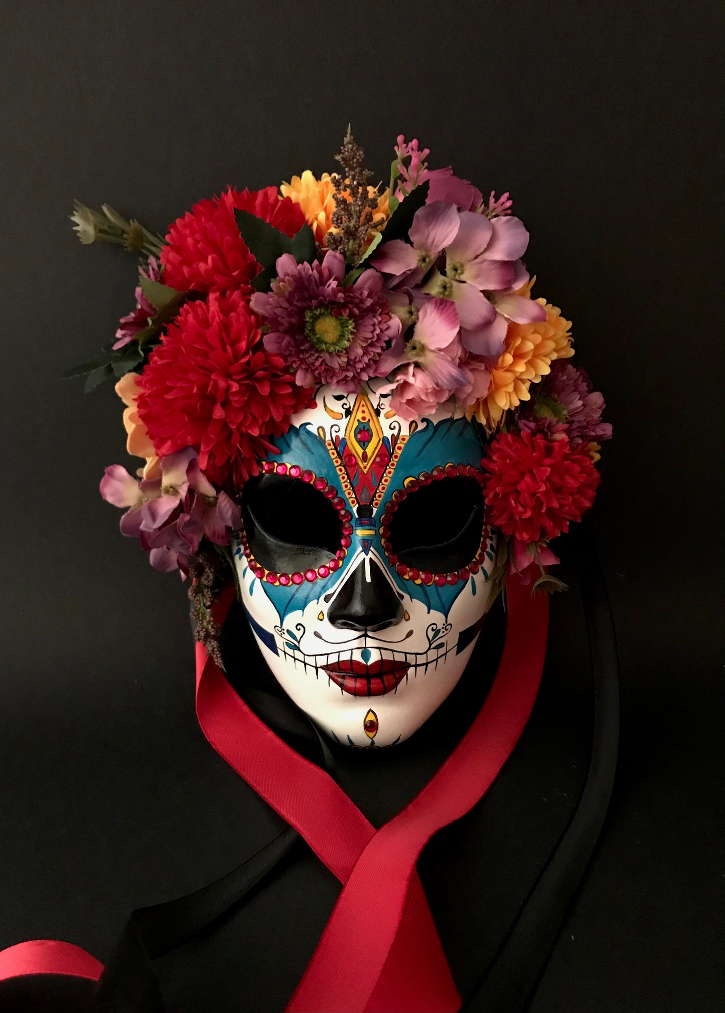 Catrina with colored flowers