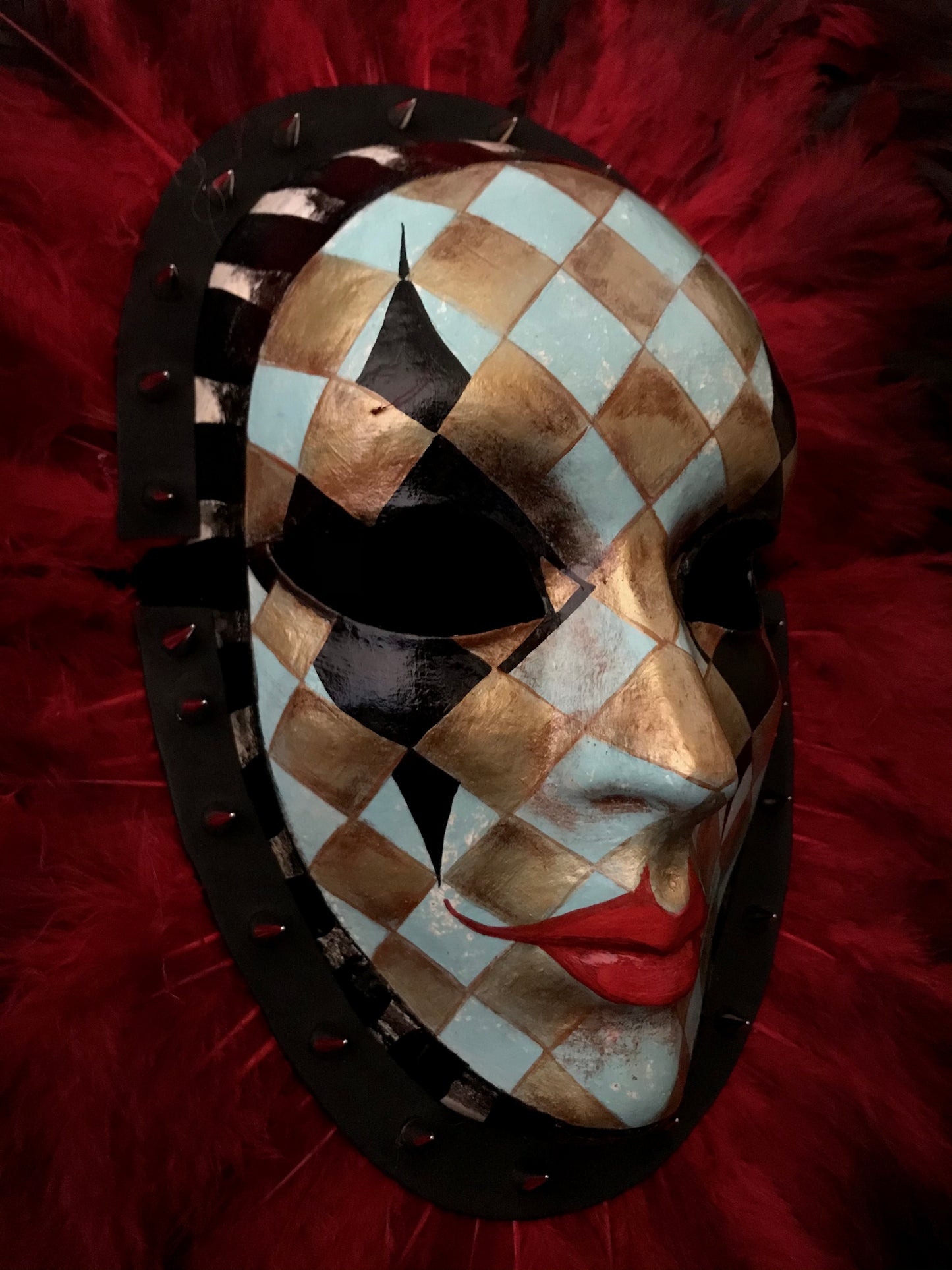 Double mask with feathers