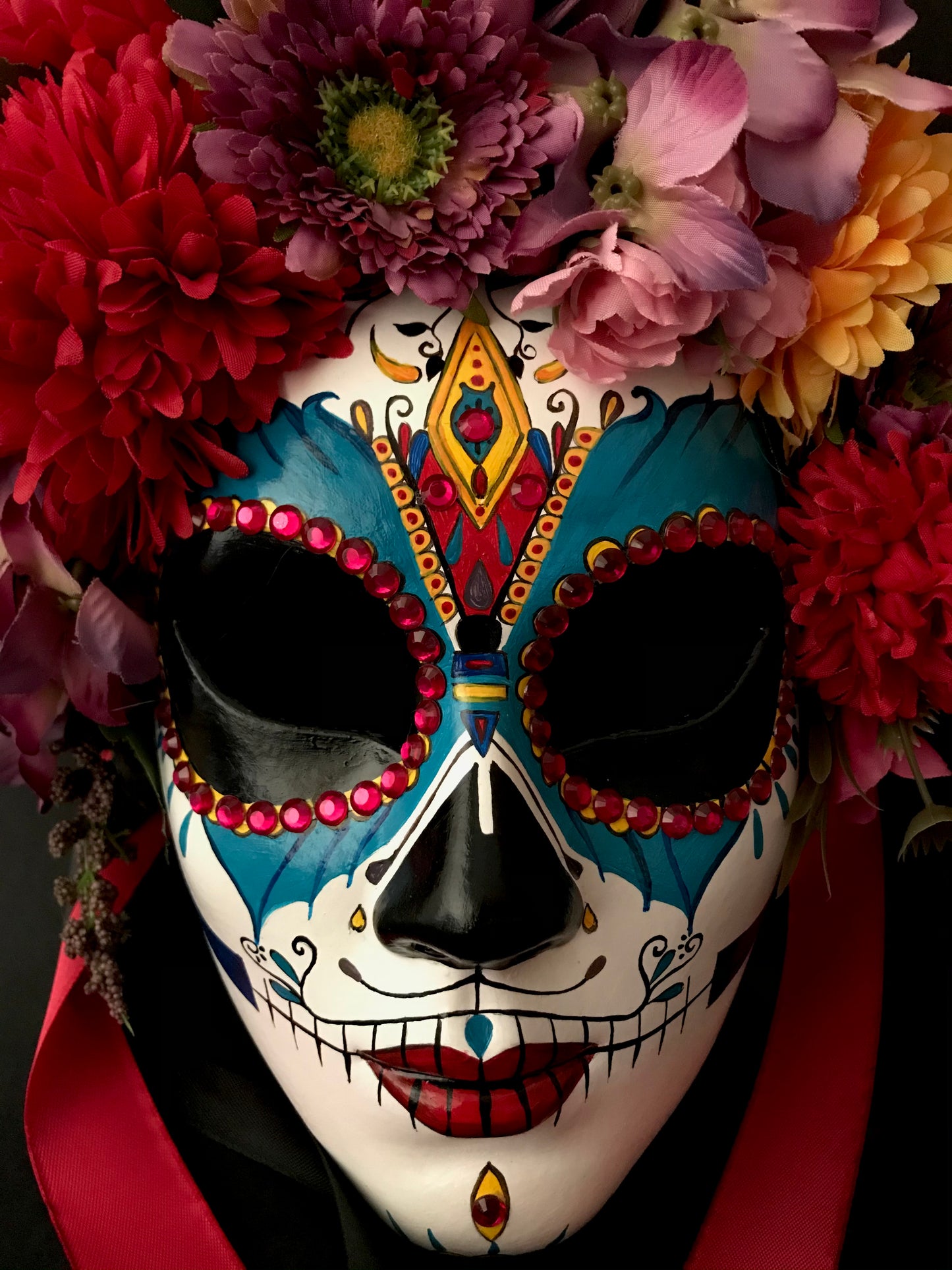 Catrina with colored flowers