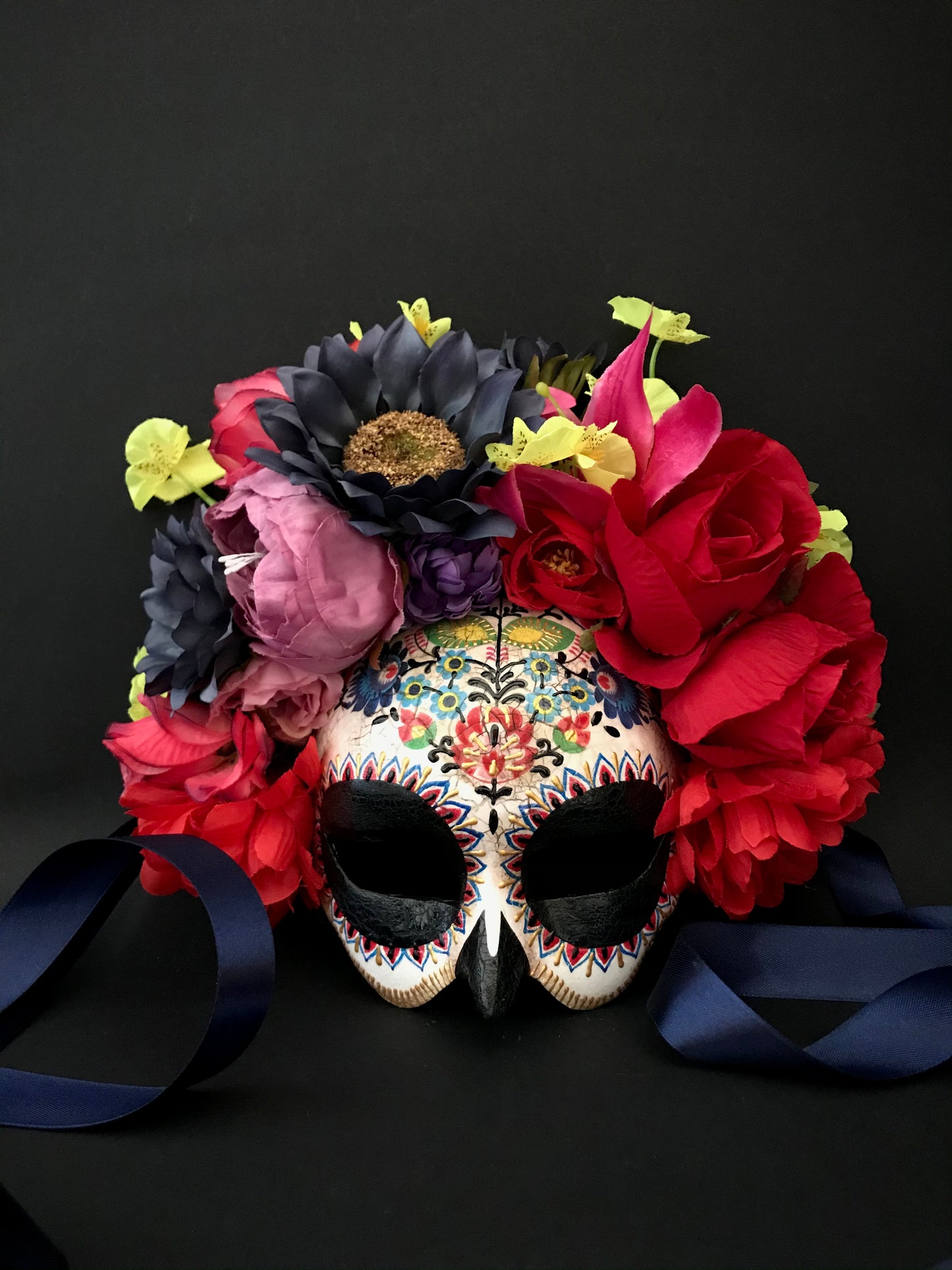 Half face Catrina mask with colored flowers