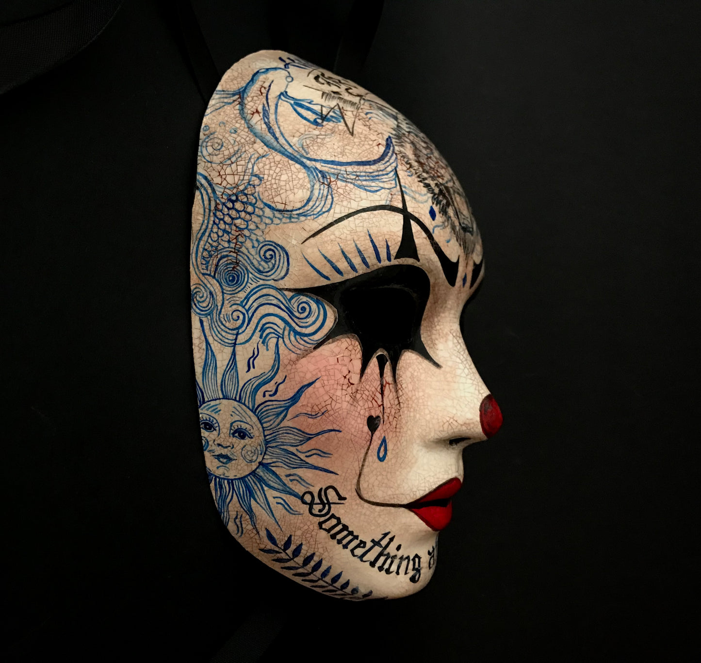 Pierrot mask with tattoos