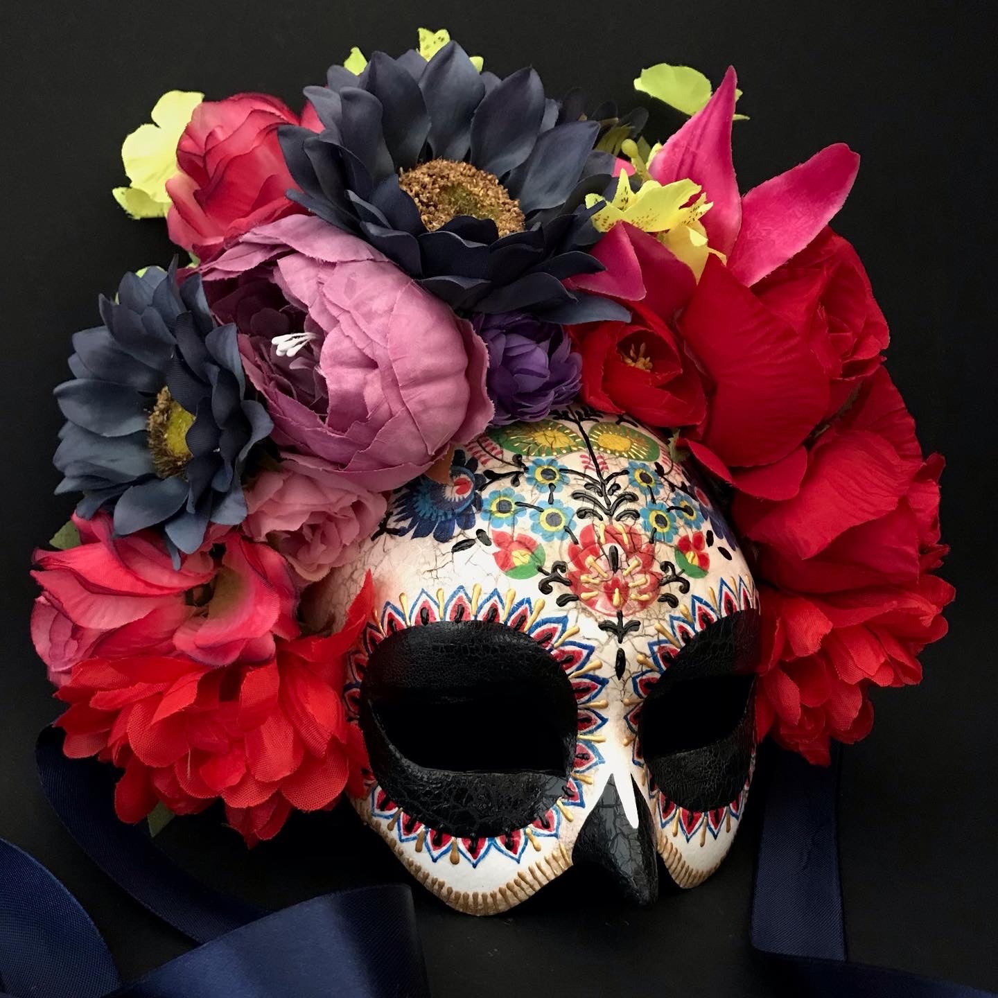 Half face Catrina mask with colored flowers