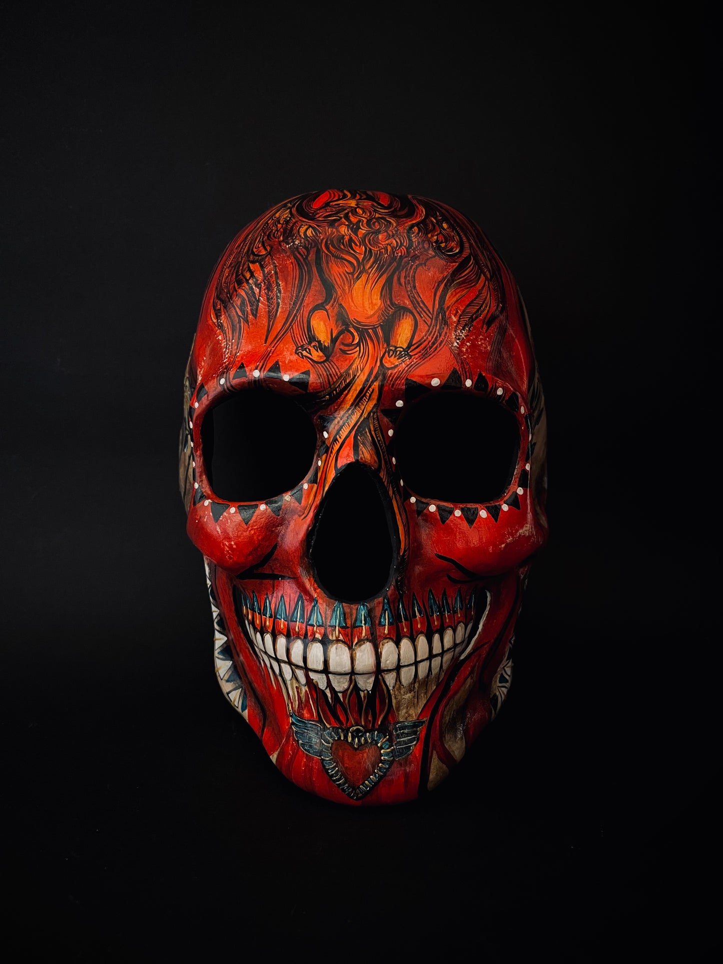 Red skull with phoenix bird. Skull mask.