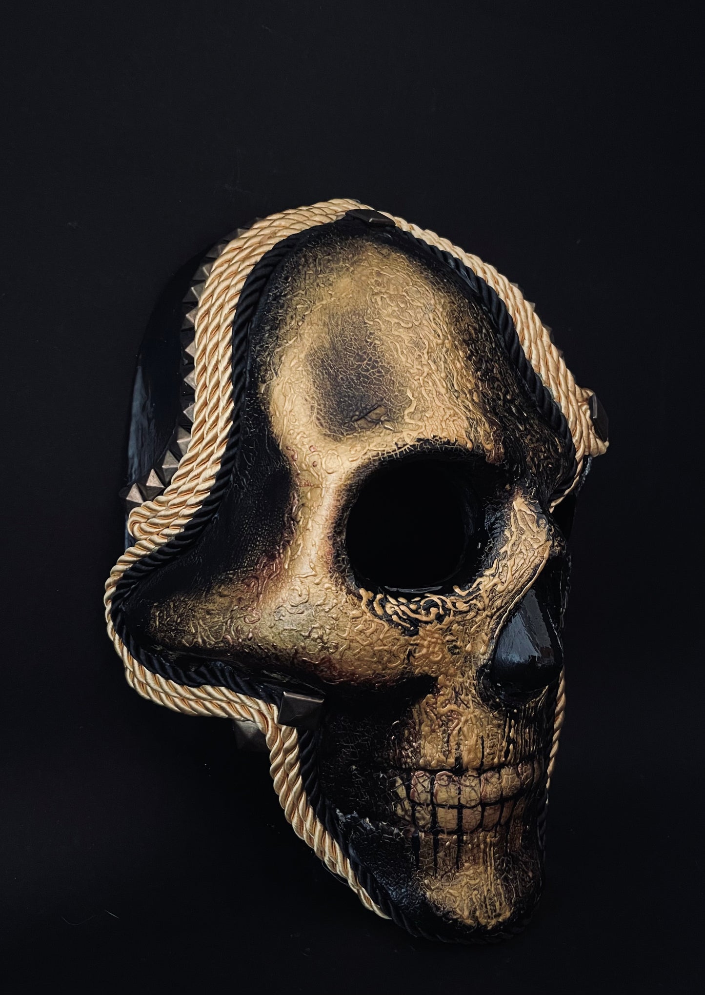 Skull mask.  Riveted skull mask