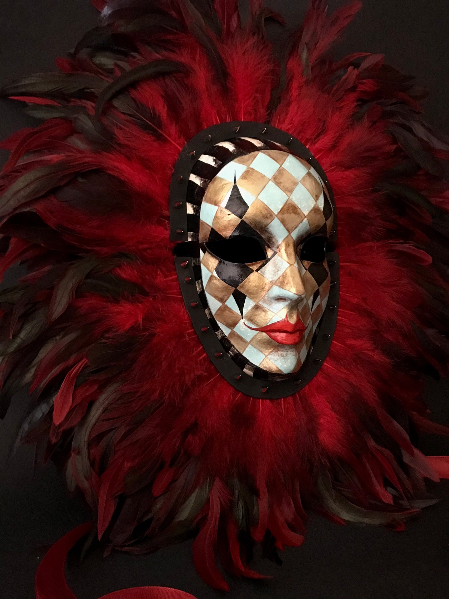 Double mask with feathers