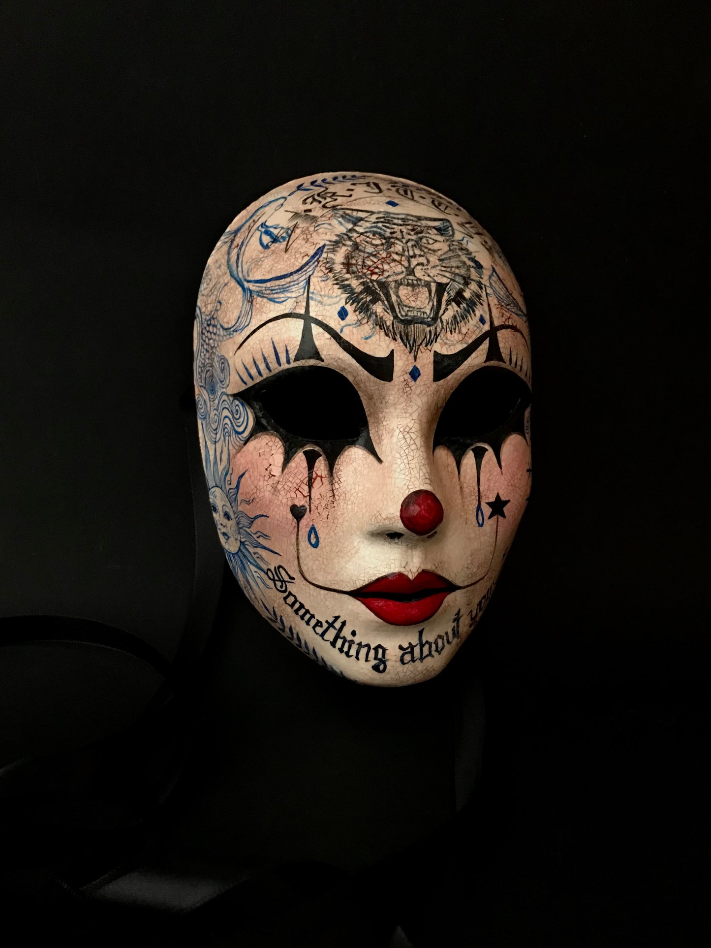 Pierrot mask with tattoos