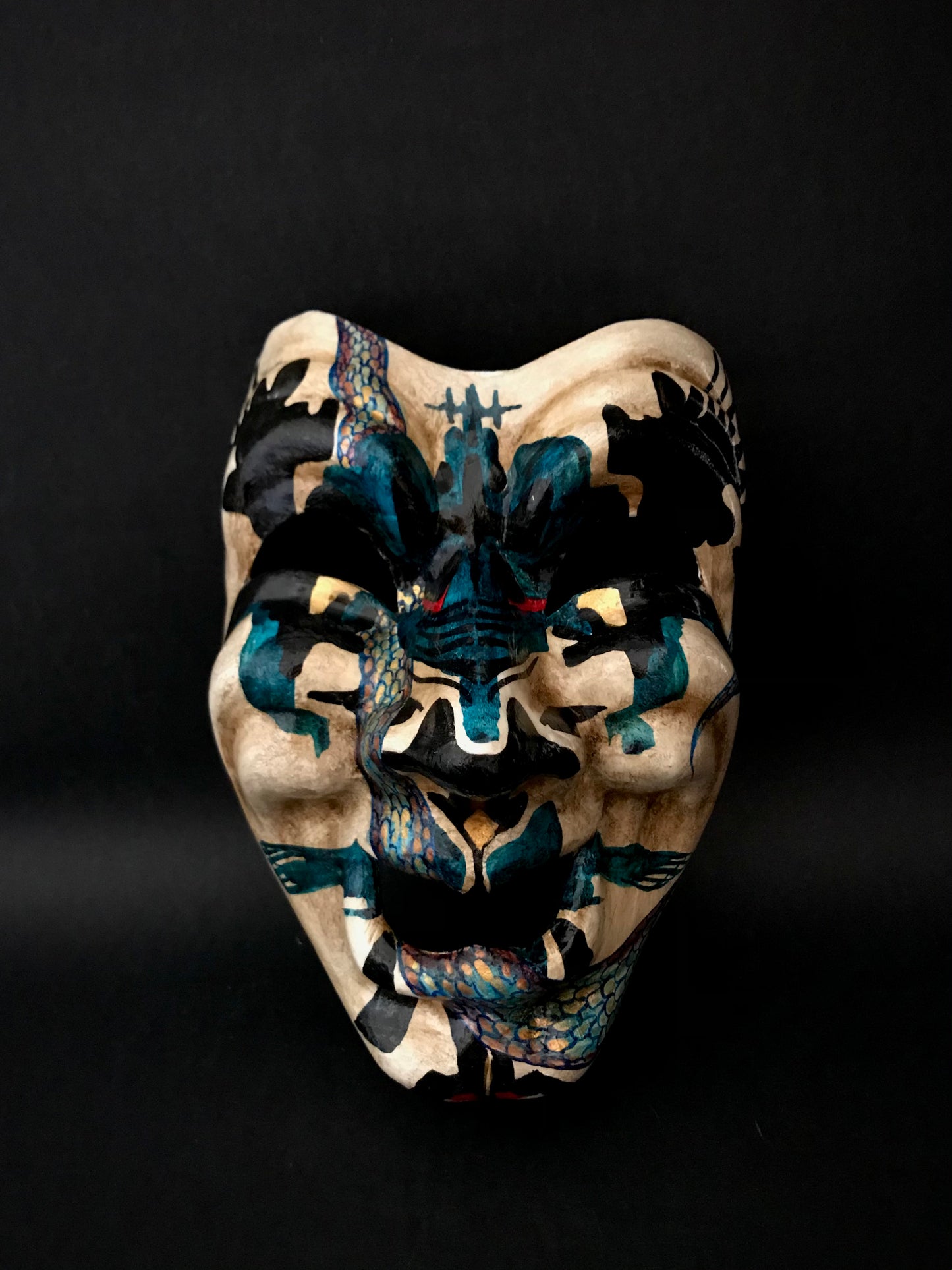 Inkblot clown mask. Clown with snakes