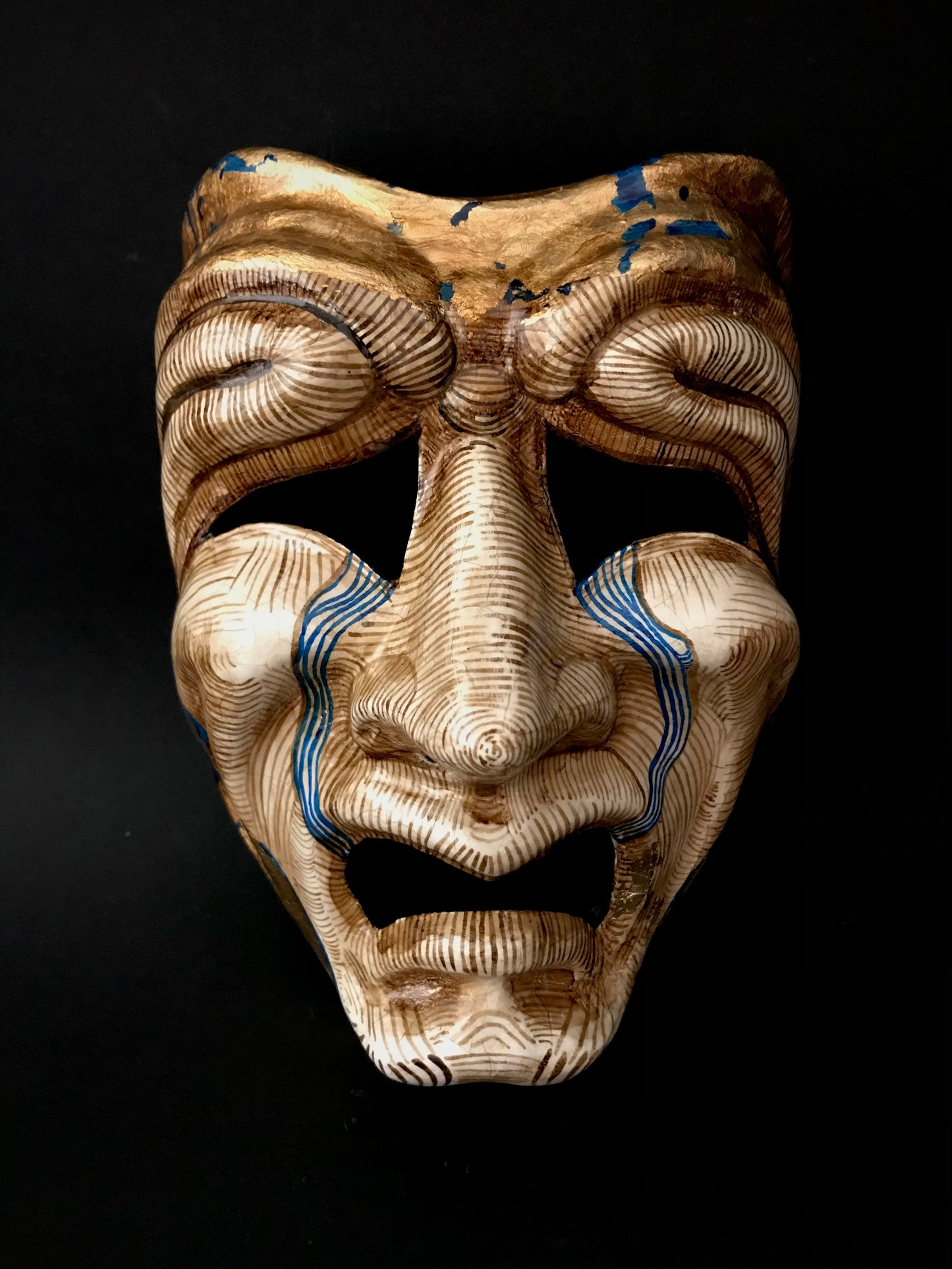 Tragedy mask with gold