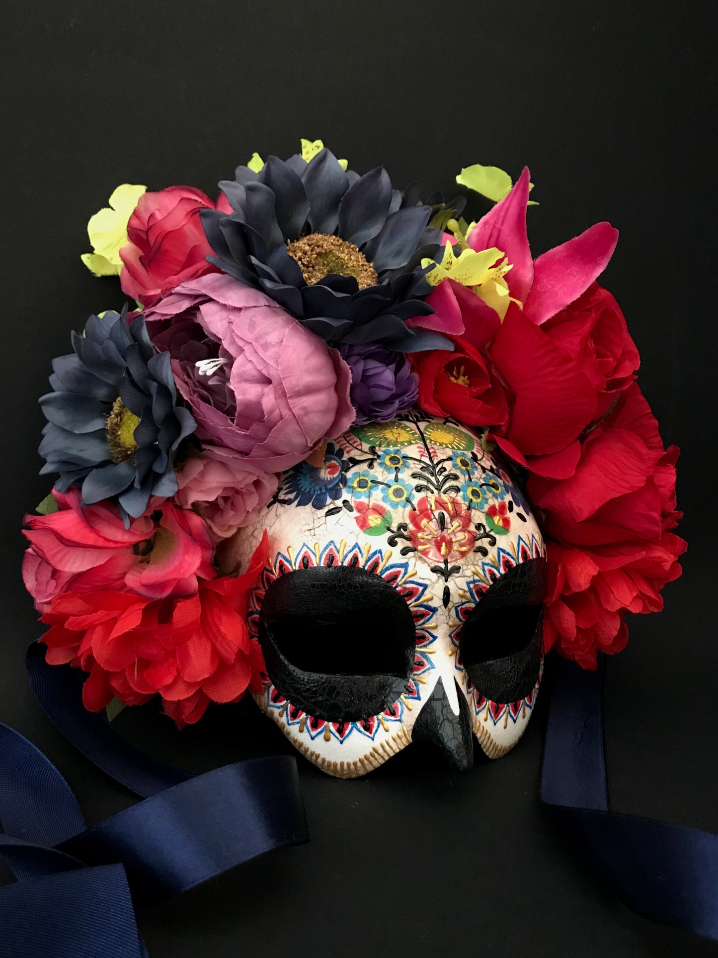 Half face Catrina mask with colored flowers