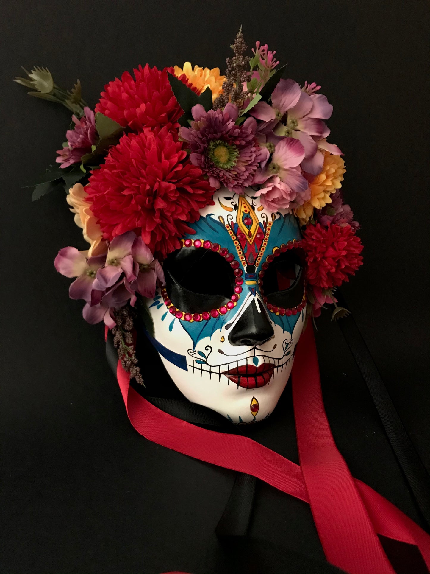 Catrina with colored flowers