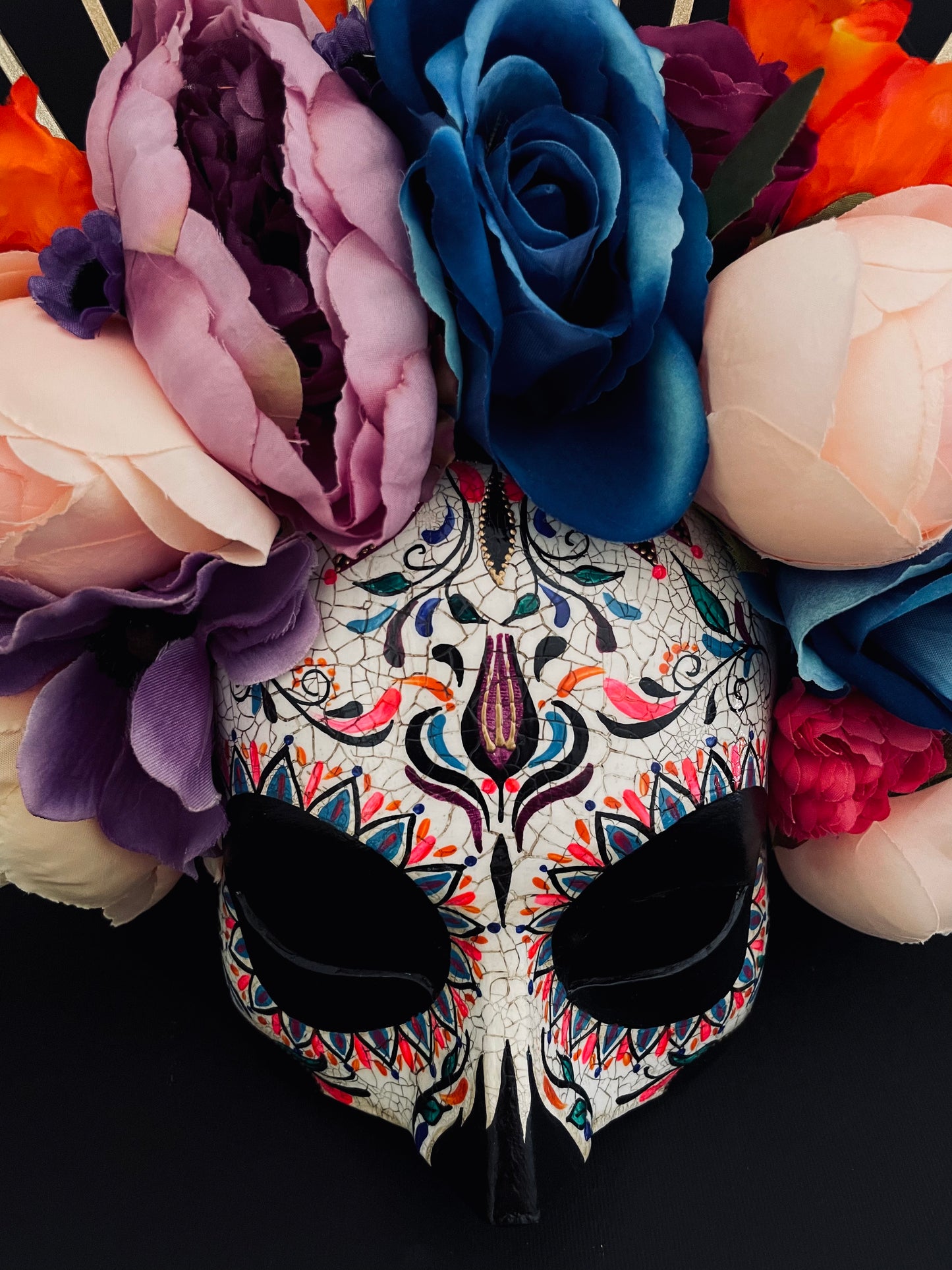 Bright colored Catrina mask. Day of the dead art.