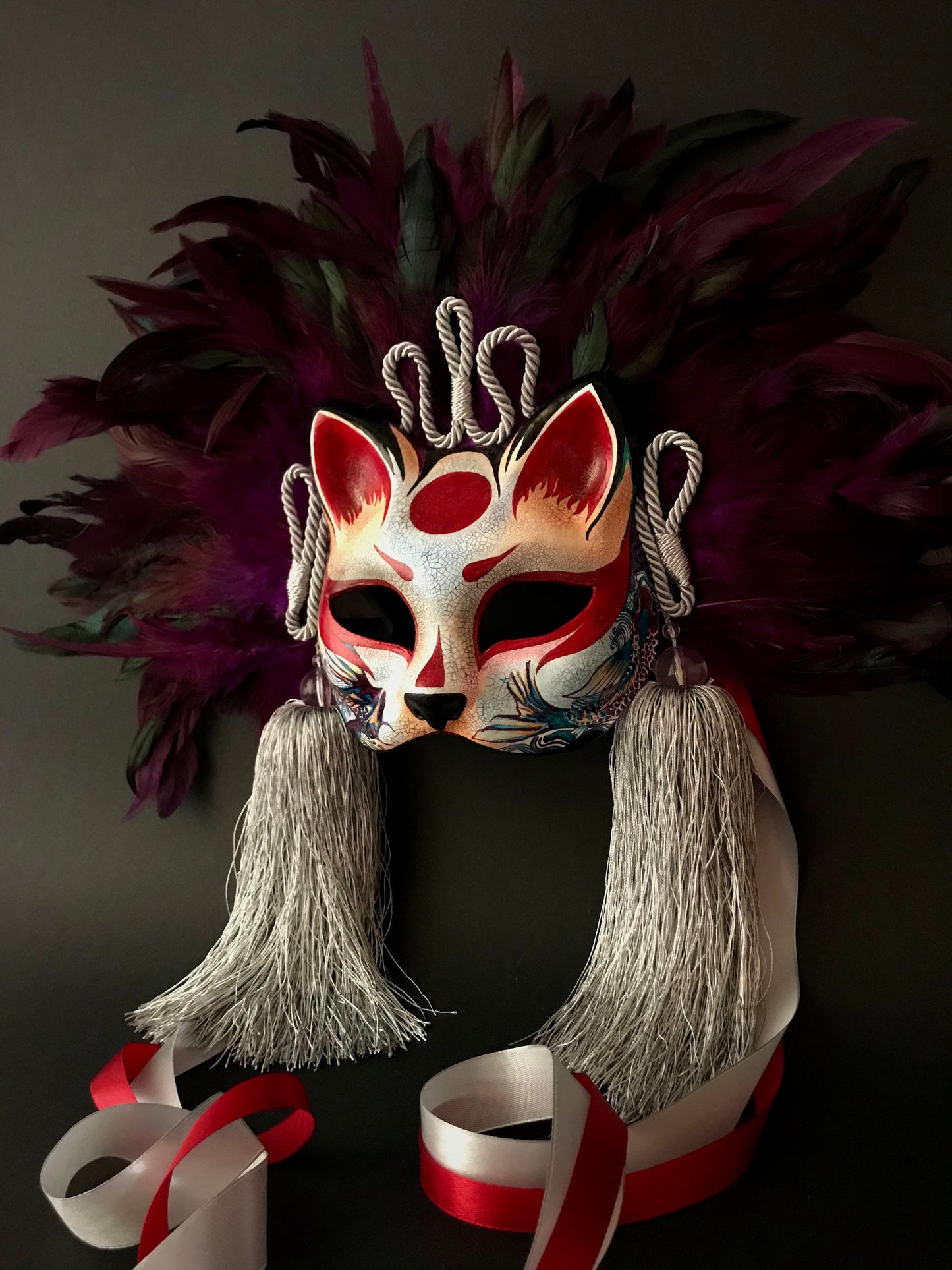 Kitsune mask with feathers