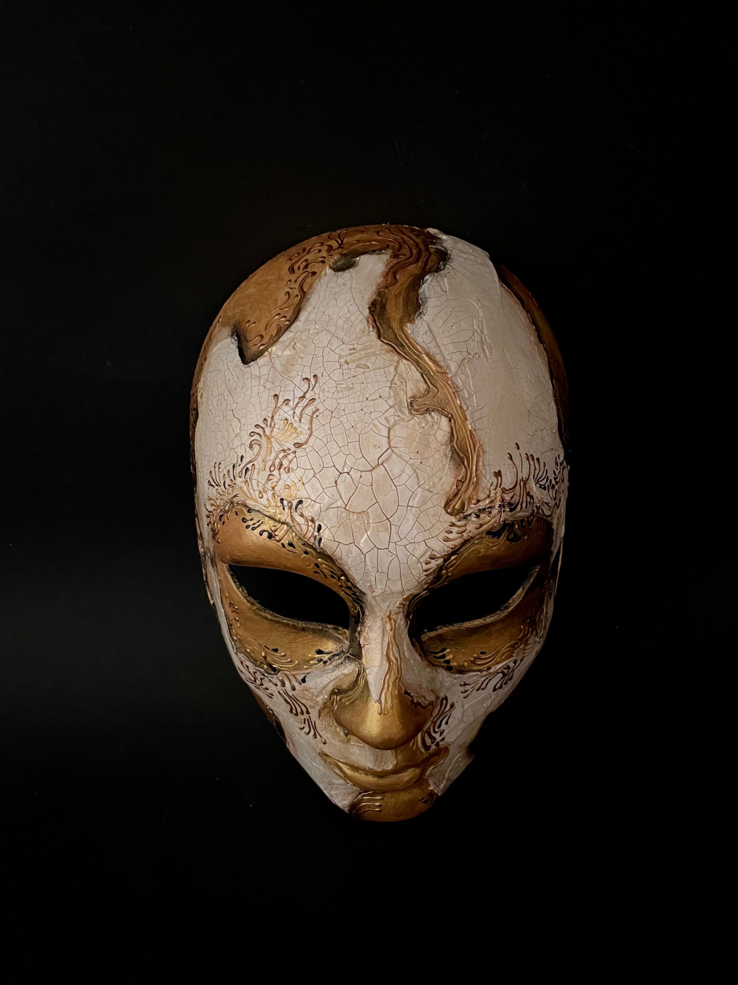 White and gold skull. Masquerade mask.