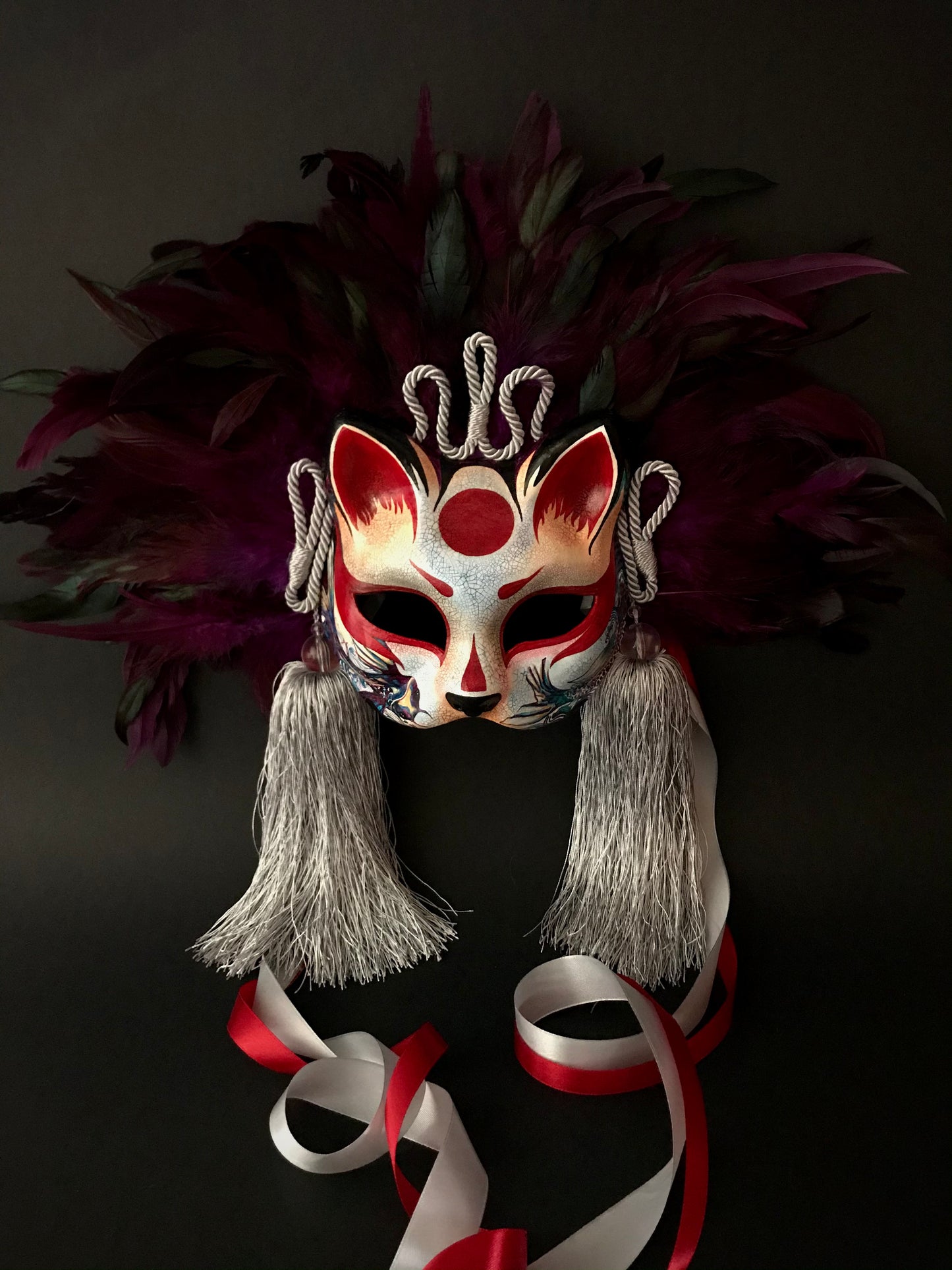 Kitsune mask with feathers