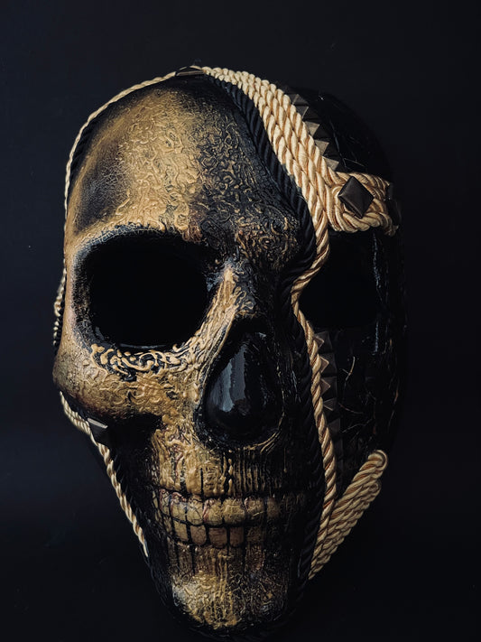 Skull mask.  Riveted skull mask