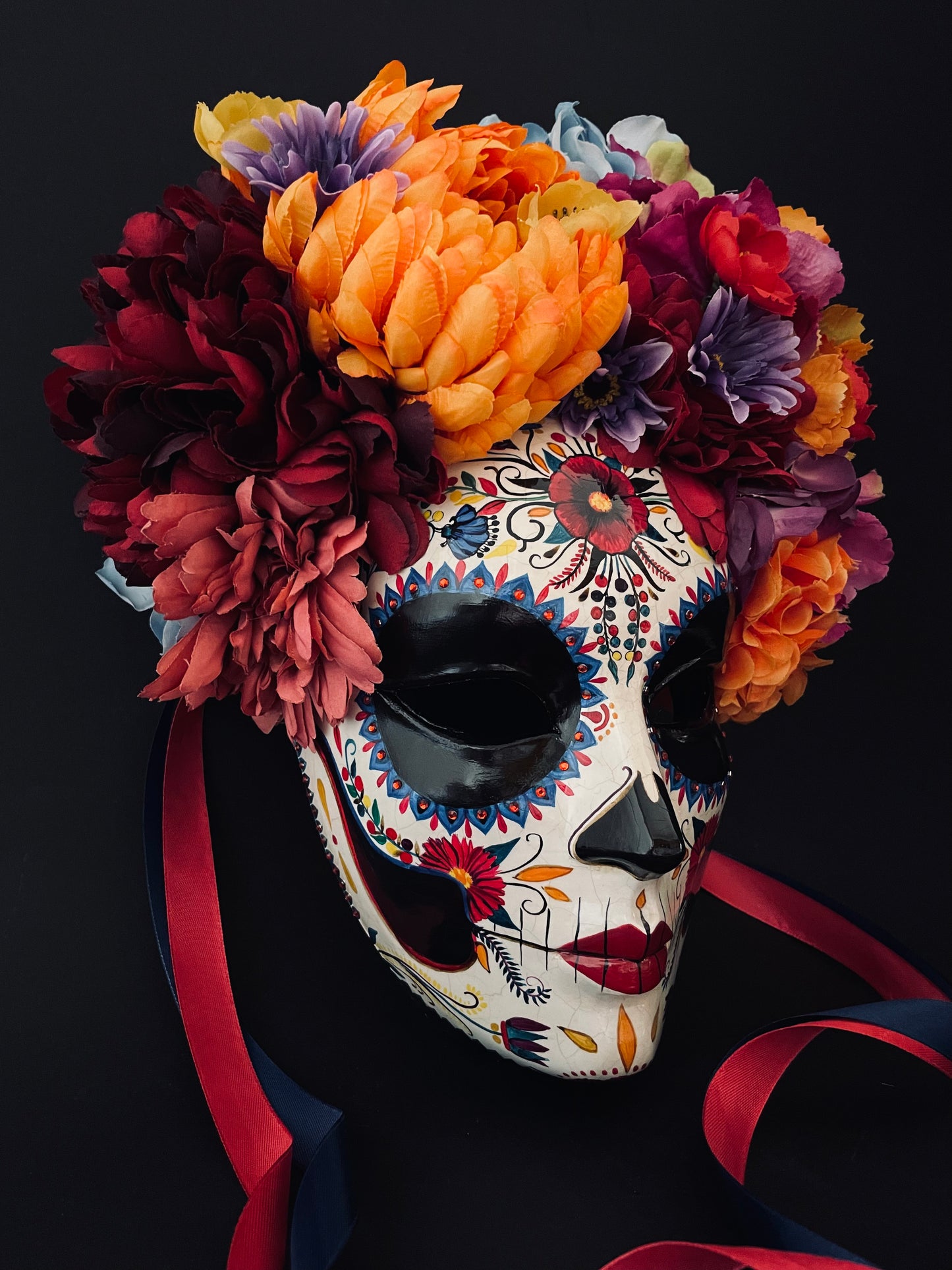 Catrina mask with colored flowers