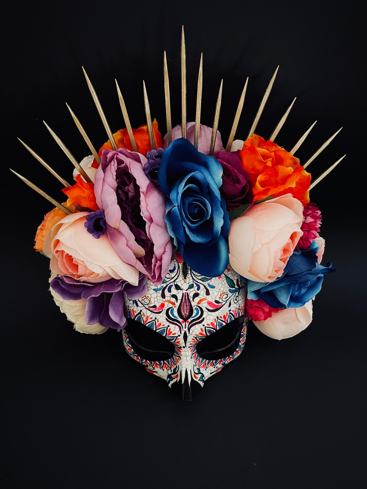 Bright colored Catrina mask. Day of the dead art.