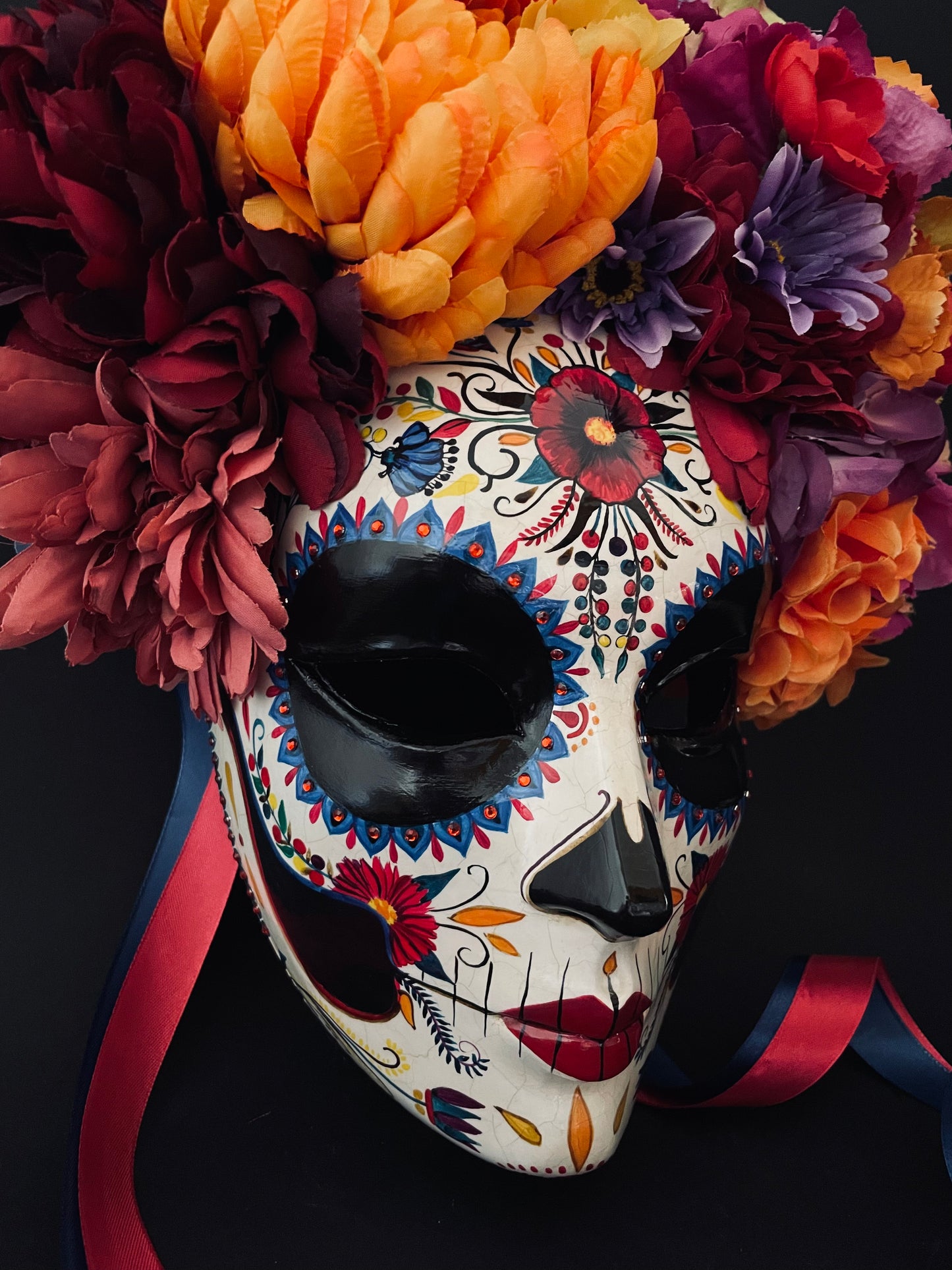 Catrina mask with colored flowers