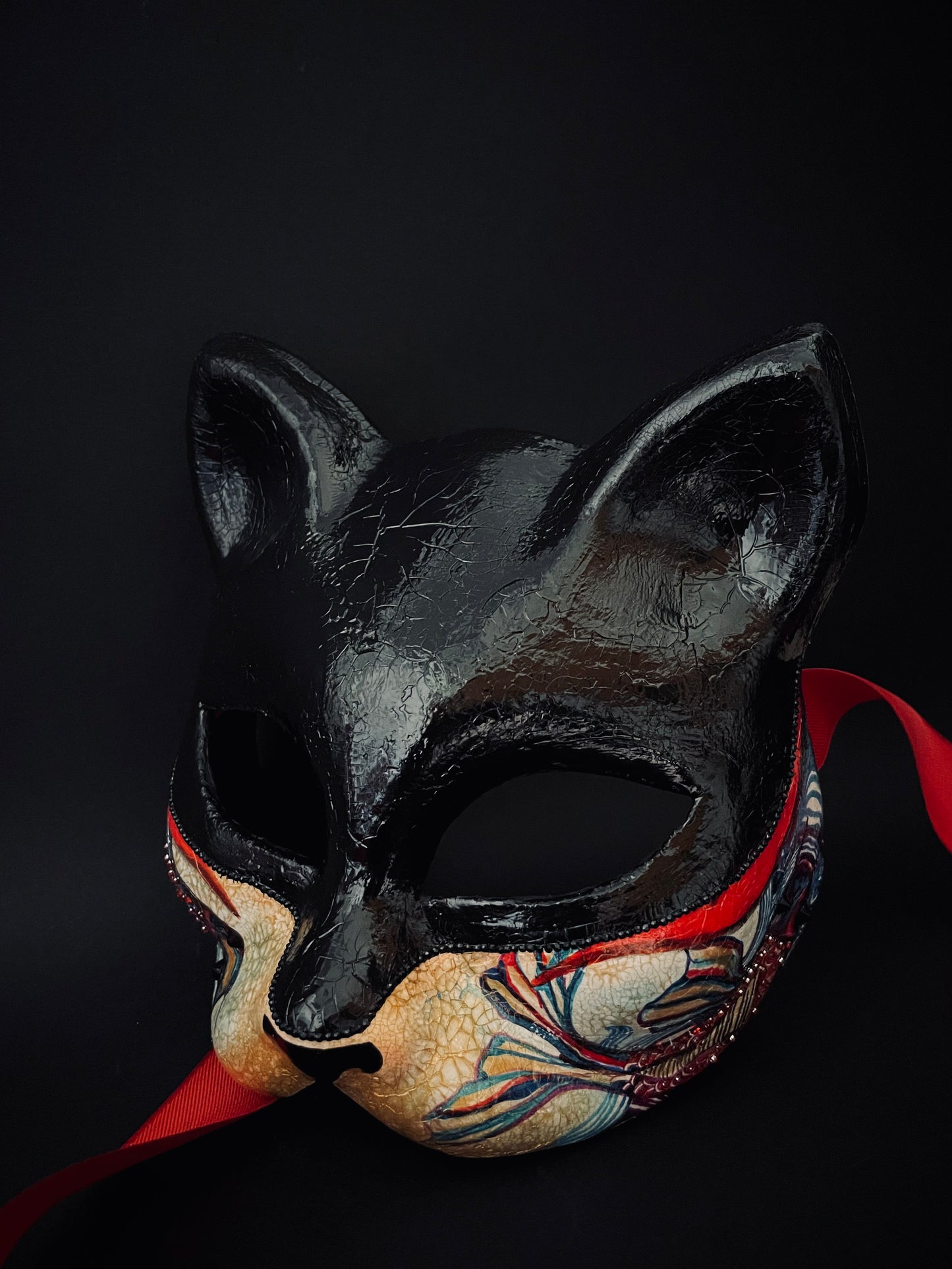 Black Kitsune mask. Japanese fox.