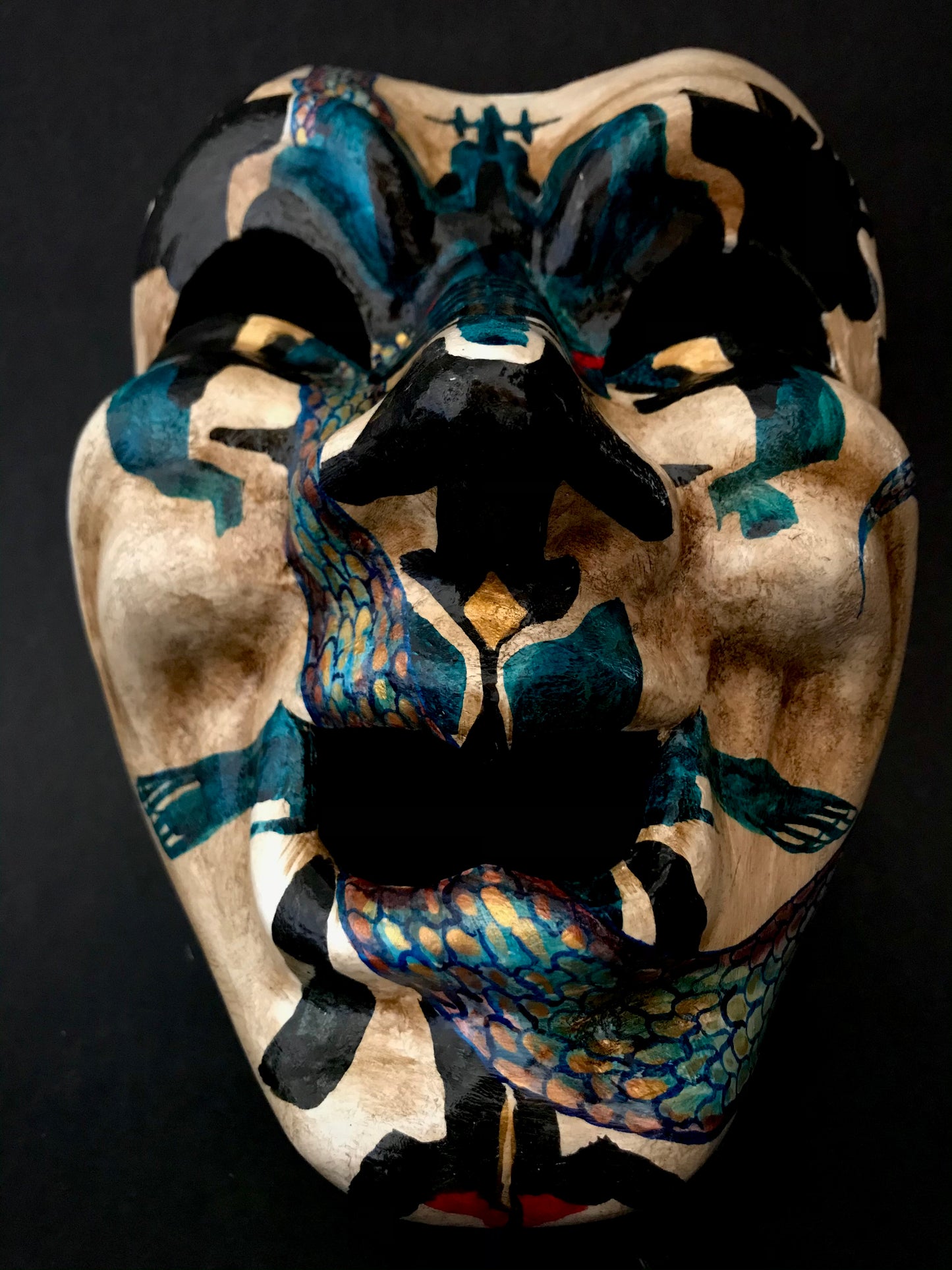 Inkblot clown mask. Clown with snakes